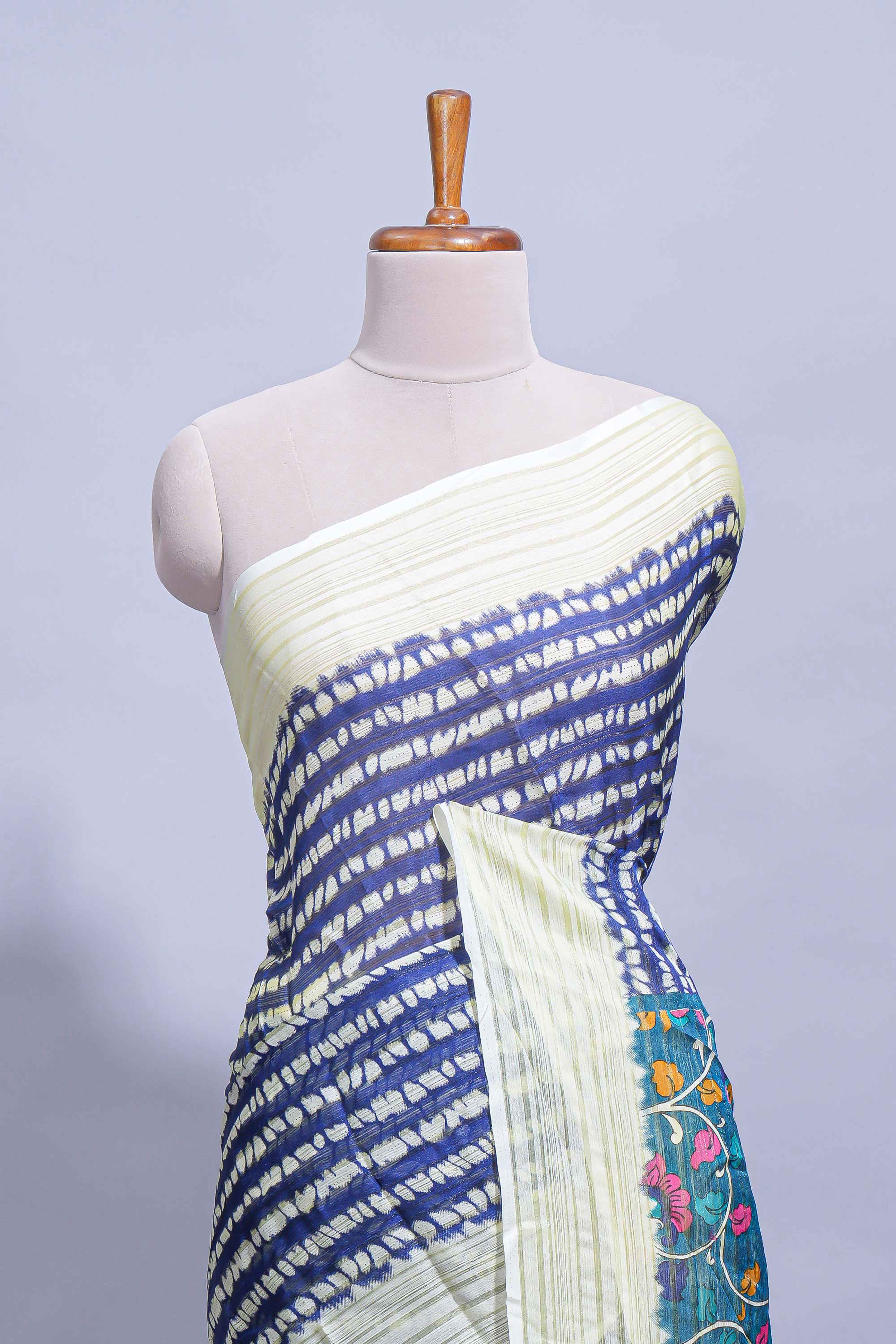 Navy blue colourshibori printed marsh mellow saree with contrast border and matching printed blouse