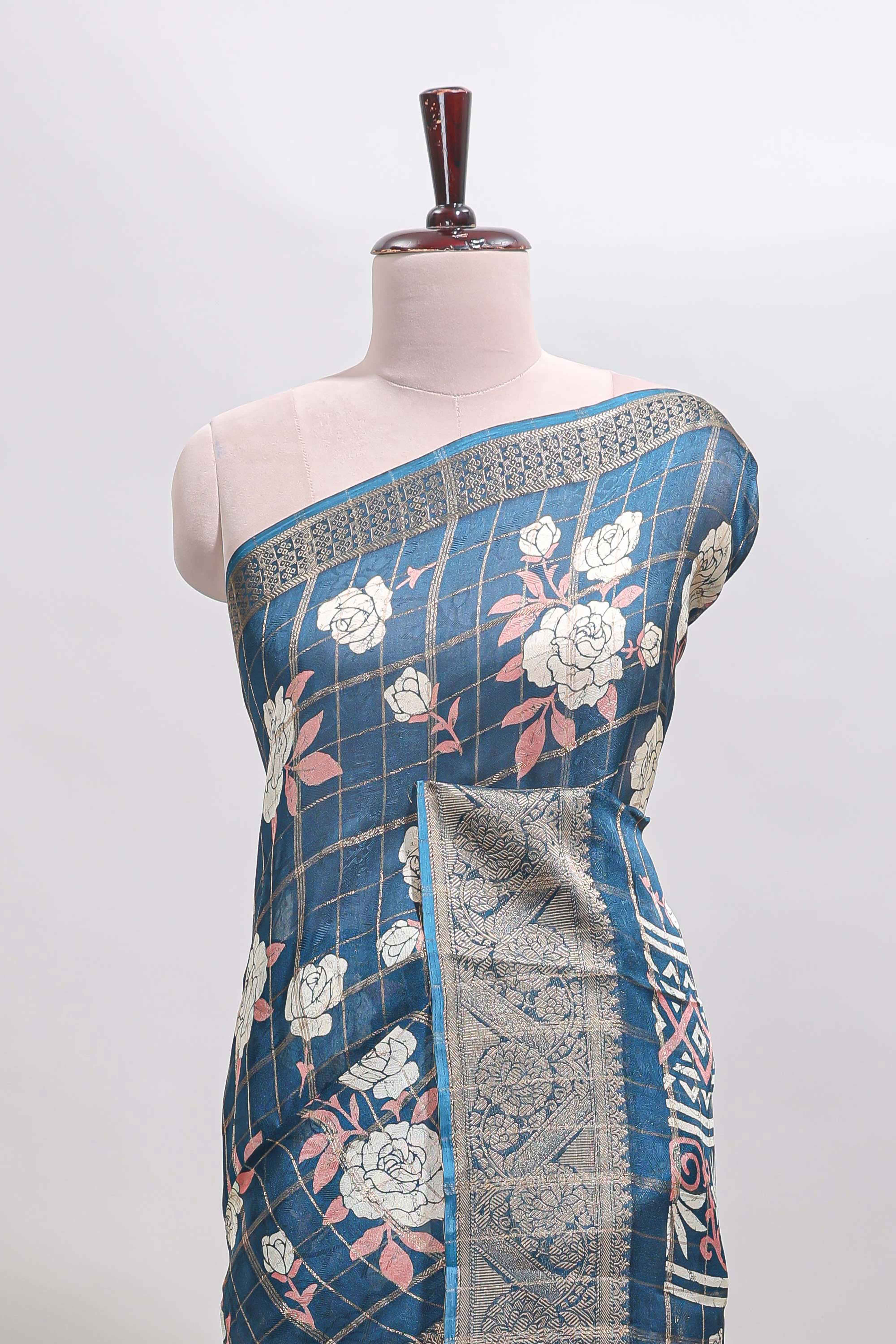 Blue checked floral design marsh mellow saree with self zari border and matching blouse