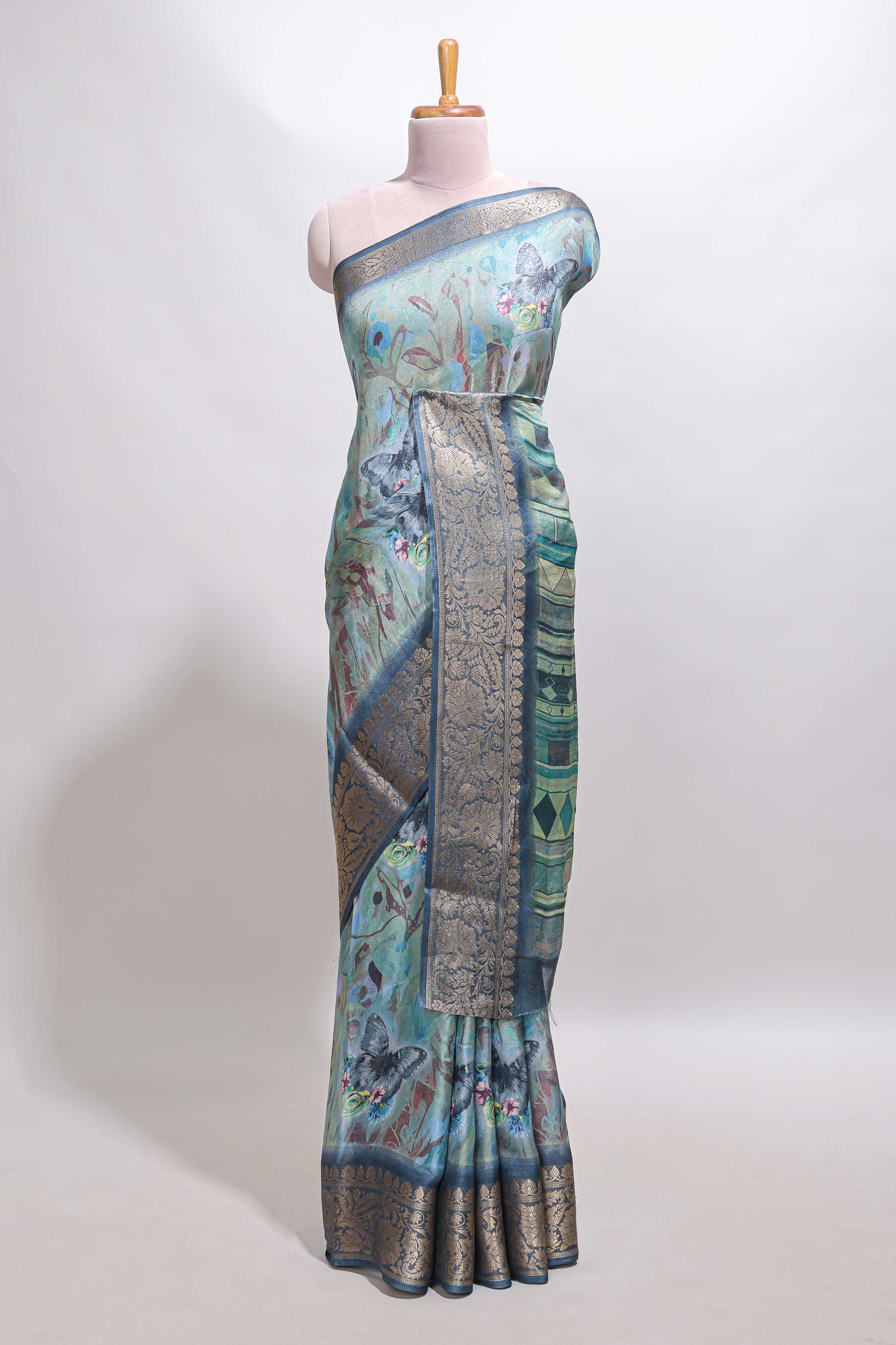 Green butterfly & floral design marsh mellow saree with contrast zari border and blouse