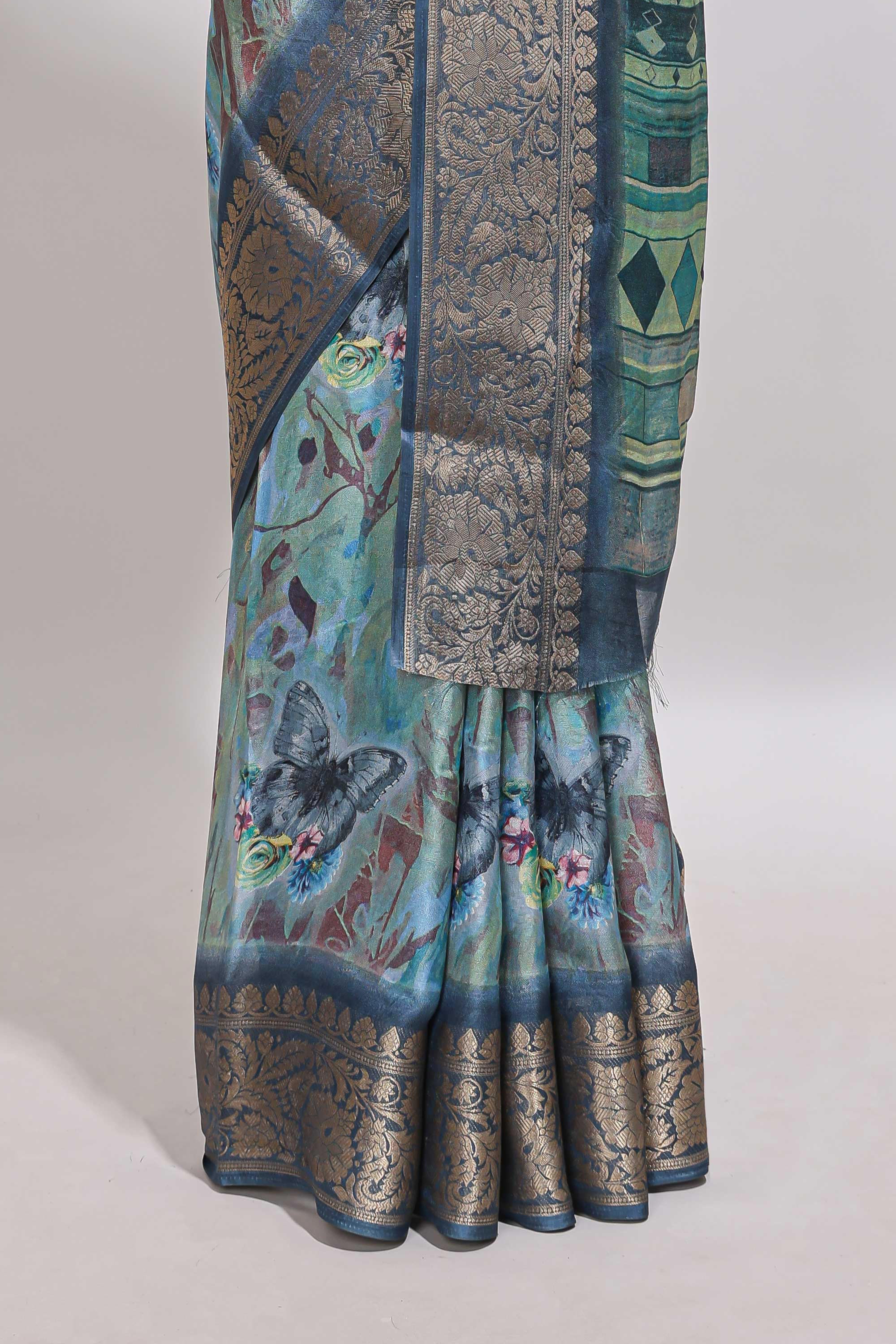 Green butterfly & floral design marsh mellow saree with contrast zari border and blouse