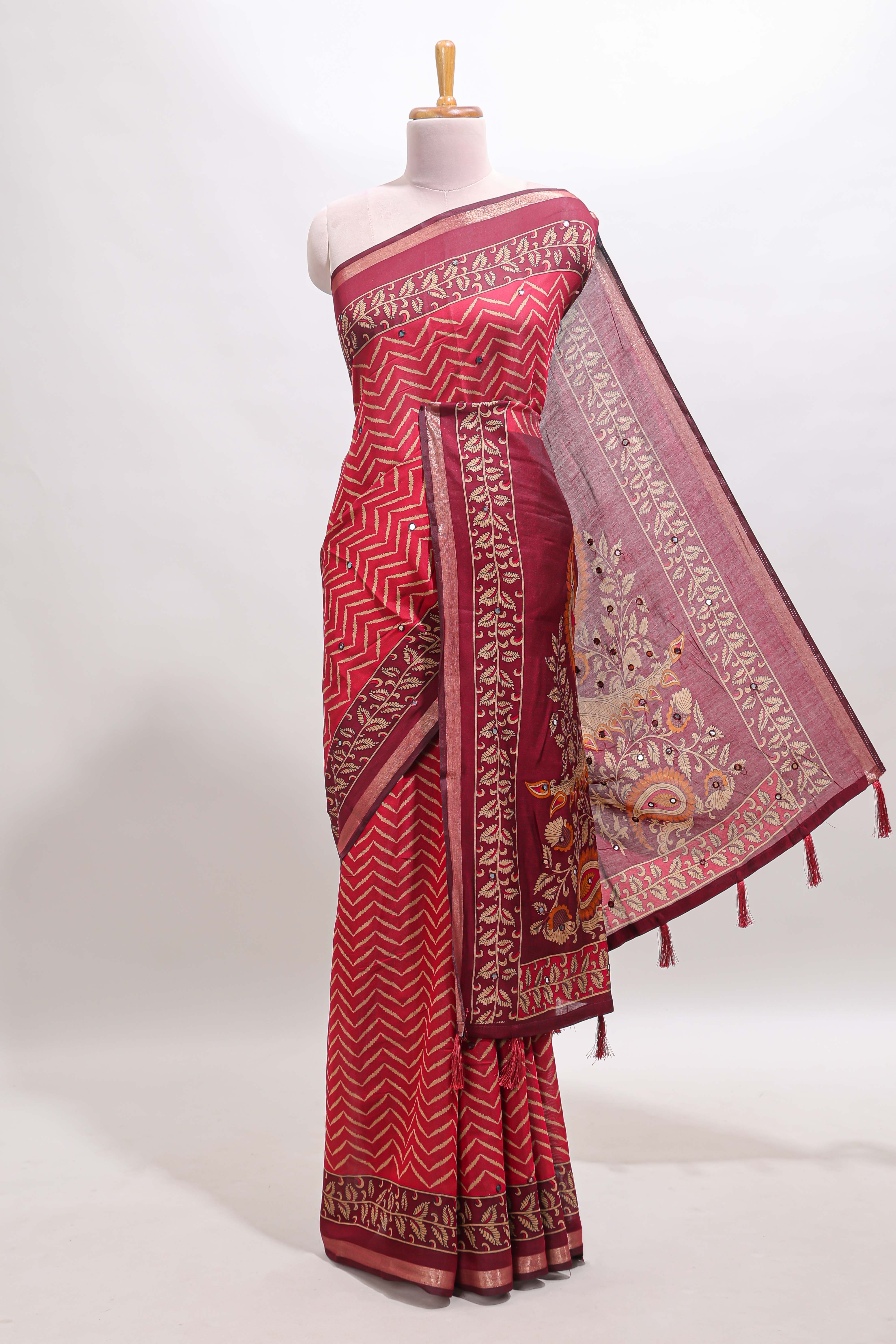Maroon chevron print marsh mellow saree with contrast zari border and contrast blouse