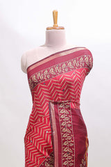 Maroon chevron print marsh mellow saree with contrast zari border and contrast blouse