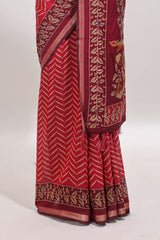 Maroon chevron print marsh mellow saree with contrast zari border and contrast blouse