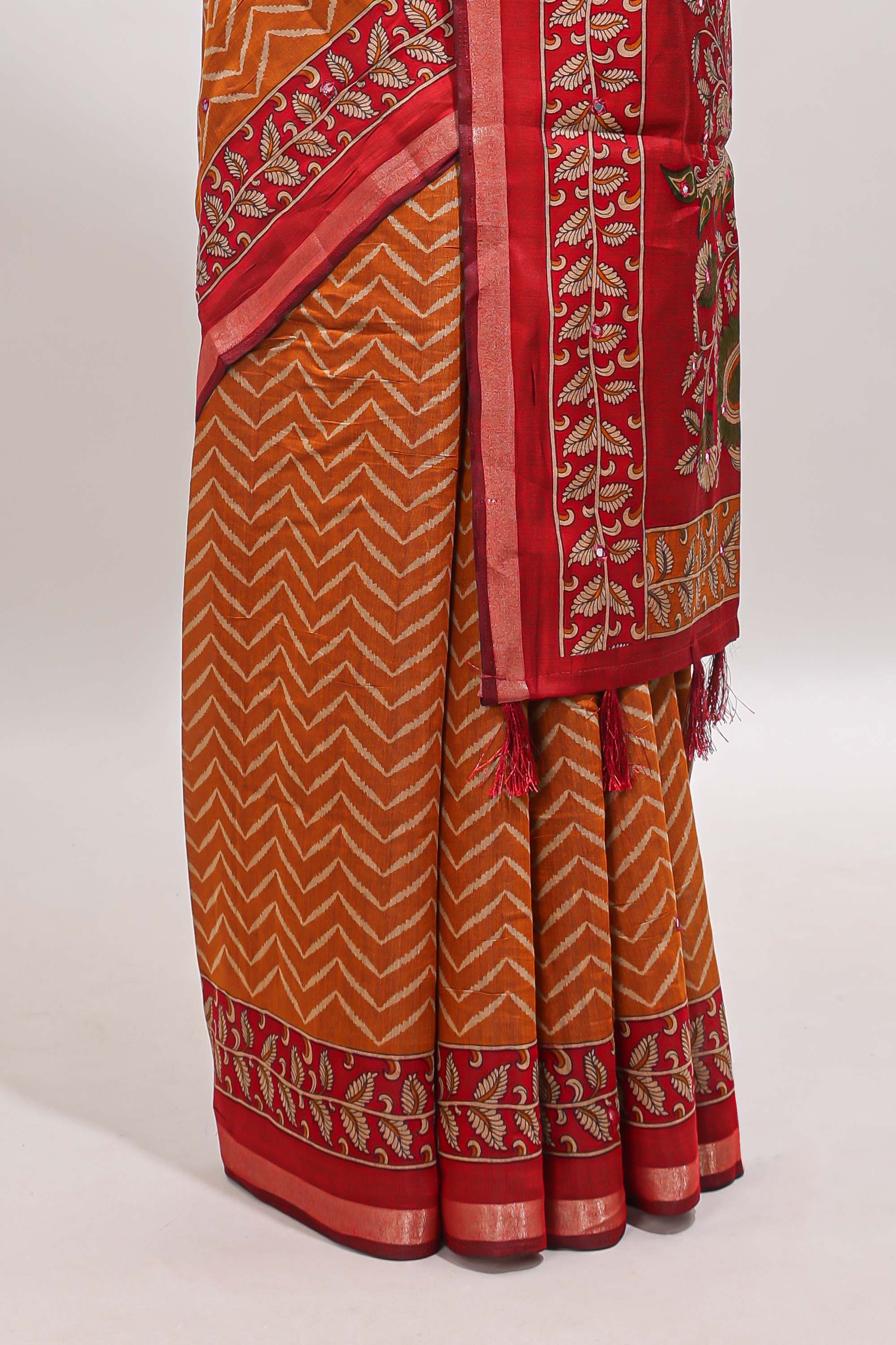 Mustard yellow chevron print marsh mellow saree with contrast zari border and contrast blouse