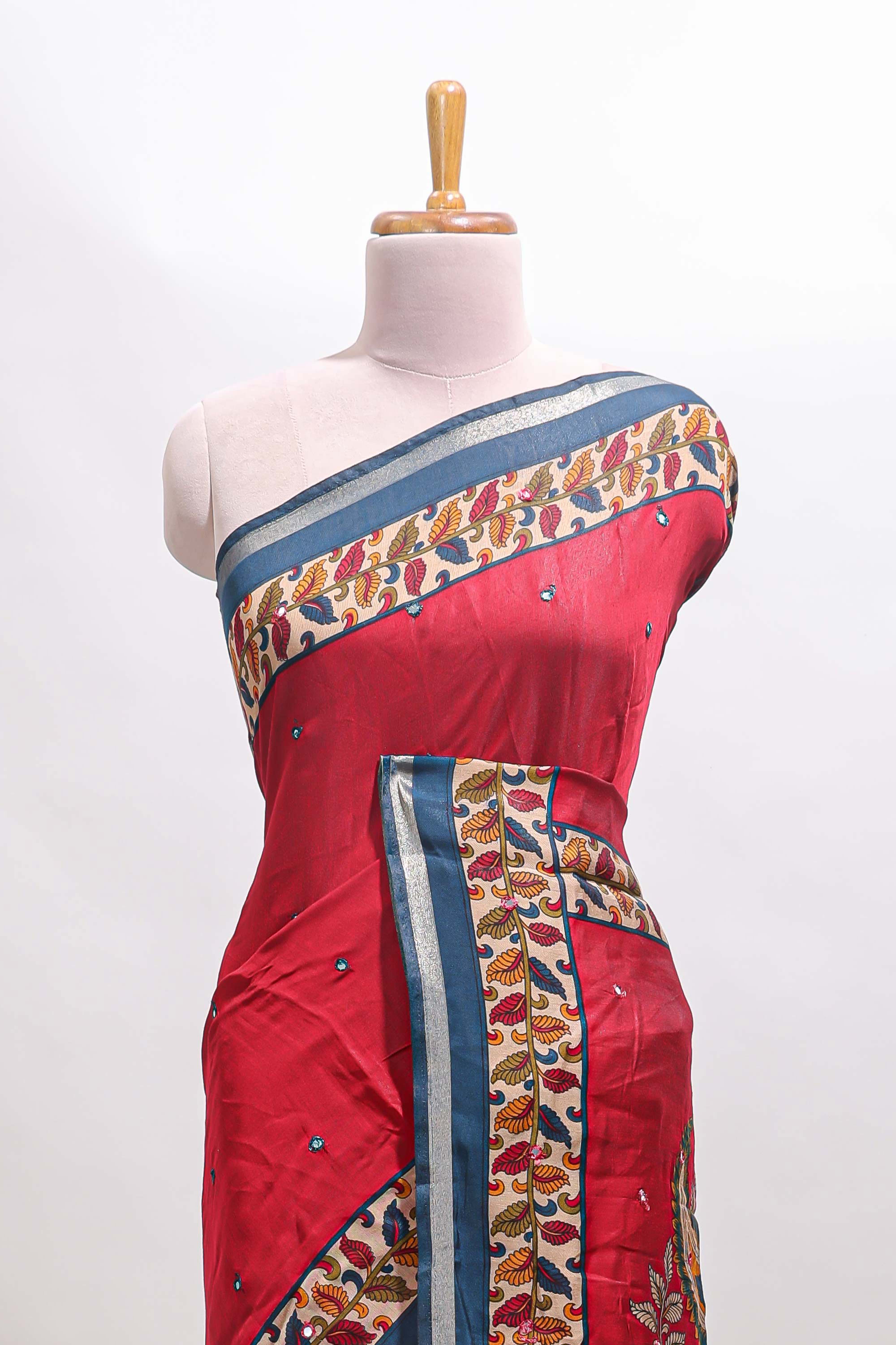 Maroon marsh mellow saree featuring mirror embroidery, contrast floral printed border & blouse