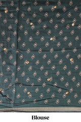 Orange marsh mellow saree featuring mirror embroidery, contrast floral printed border & blouse