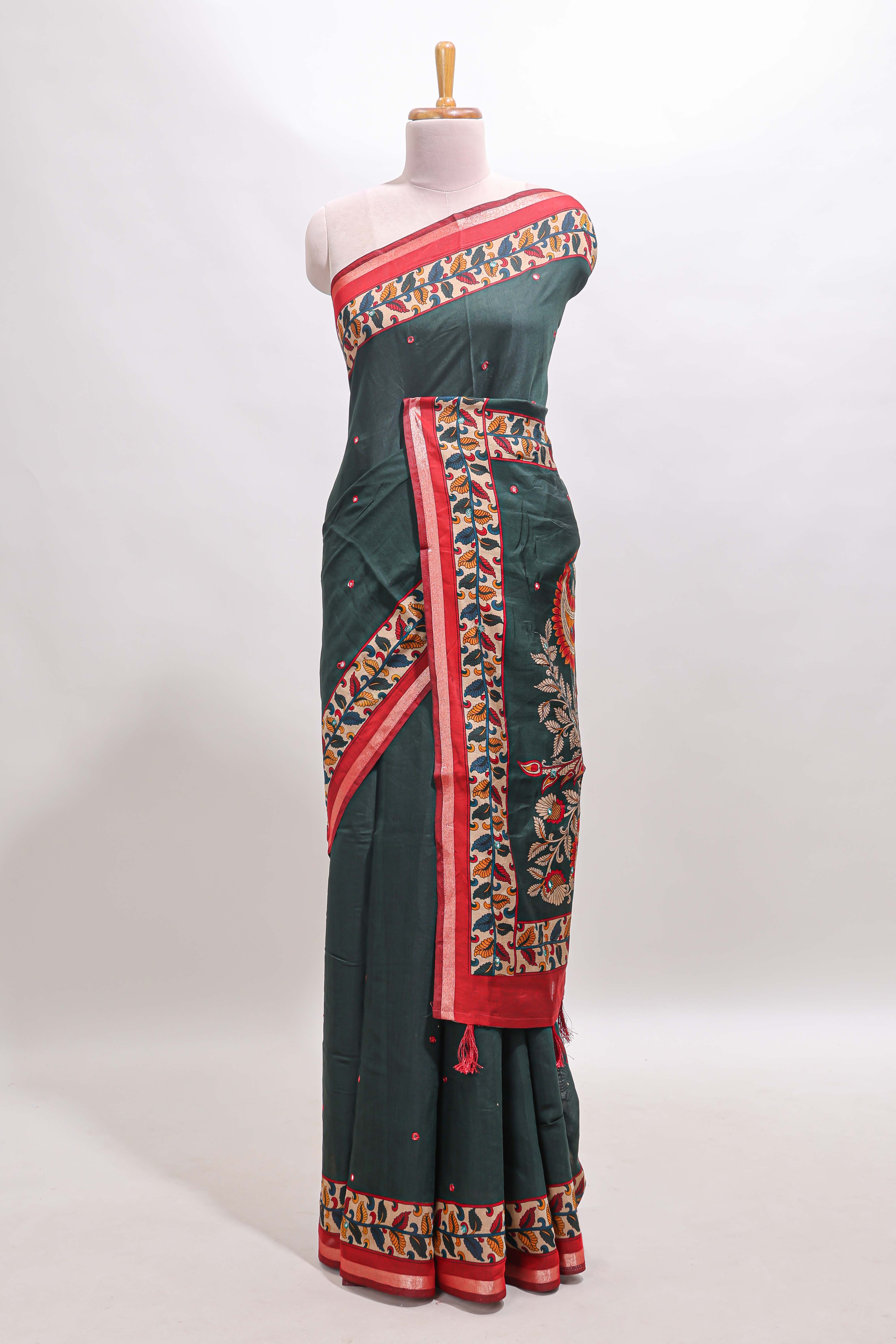 Green marsh mellow saree featuring mirror embroidery, contrast floral printed border & blouse