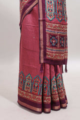 Peach printed marsh mellow saree with contrast floral border and tassel pallu