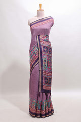Purple printed marsh mellow saree with contrast floral border and tassel pallu