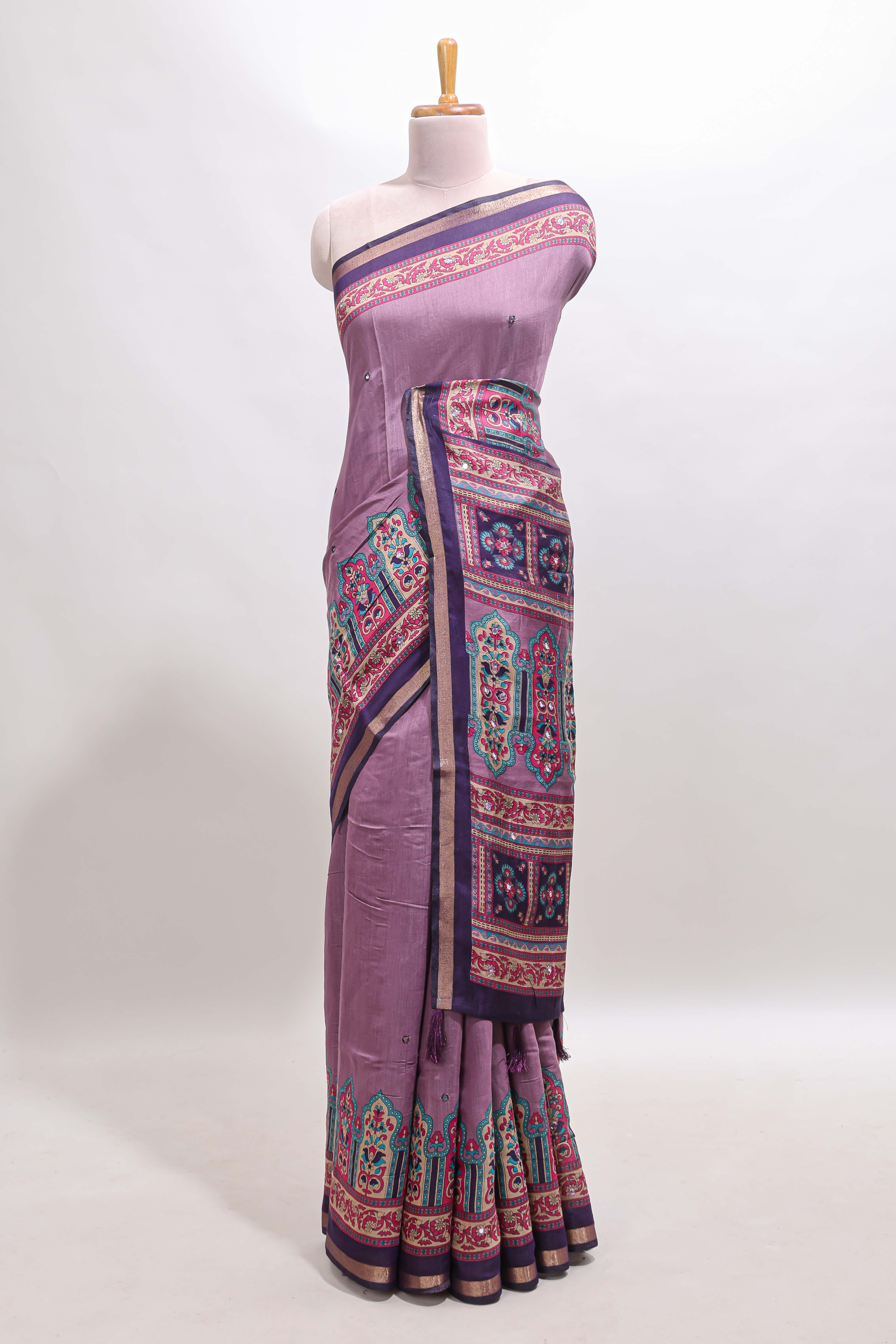 Purple printed marsh mellow saree with contrast floral border and tassel pallu