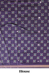 Purple printed marsh mellow saree with contrast floral border and tassel pallu