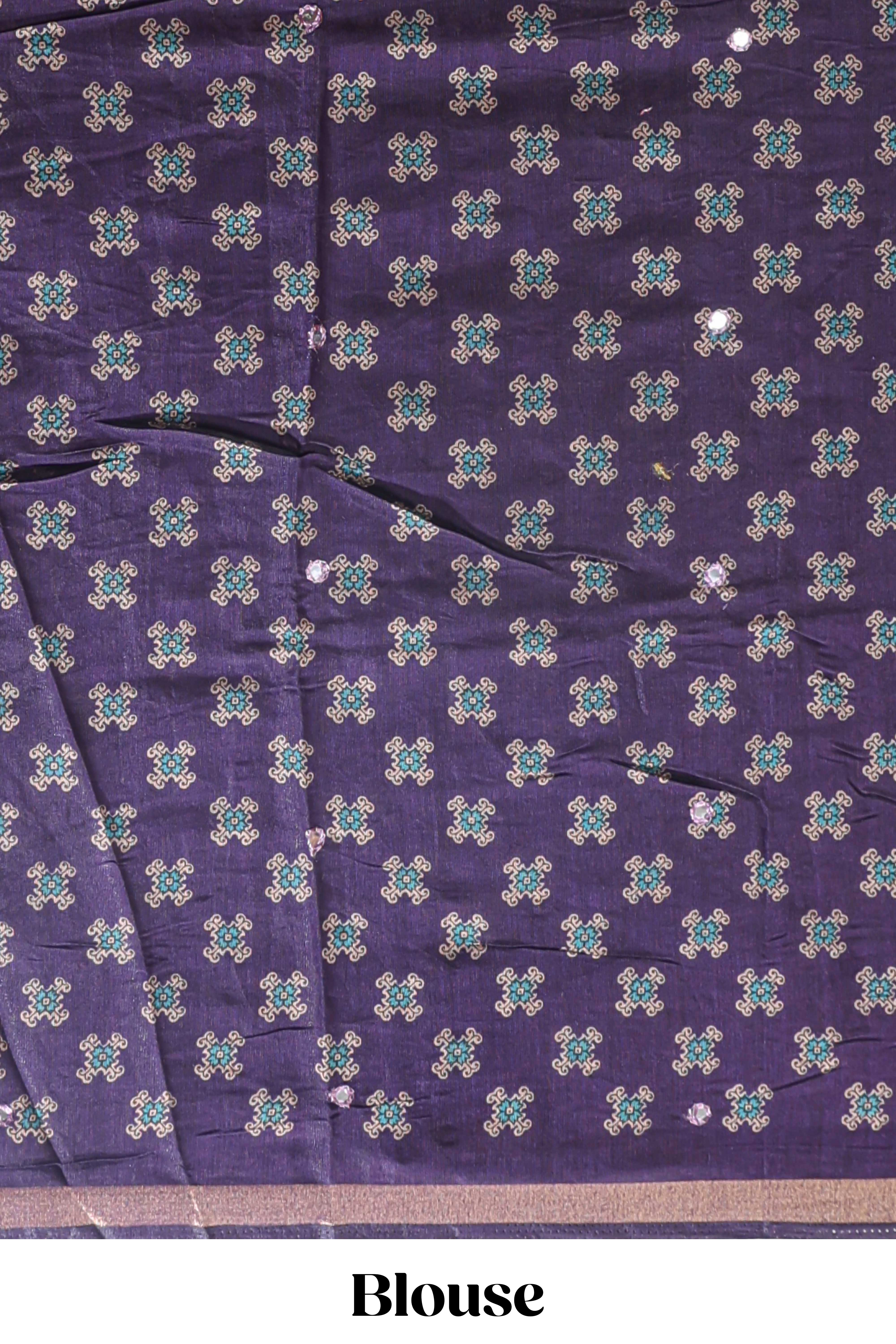Purple printed marsh mellow saree with contrast floral border and tassel pallu