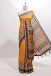 Mustard printed marsh mellow saree with contrast floral border and tassel pallu
