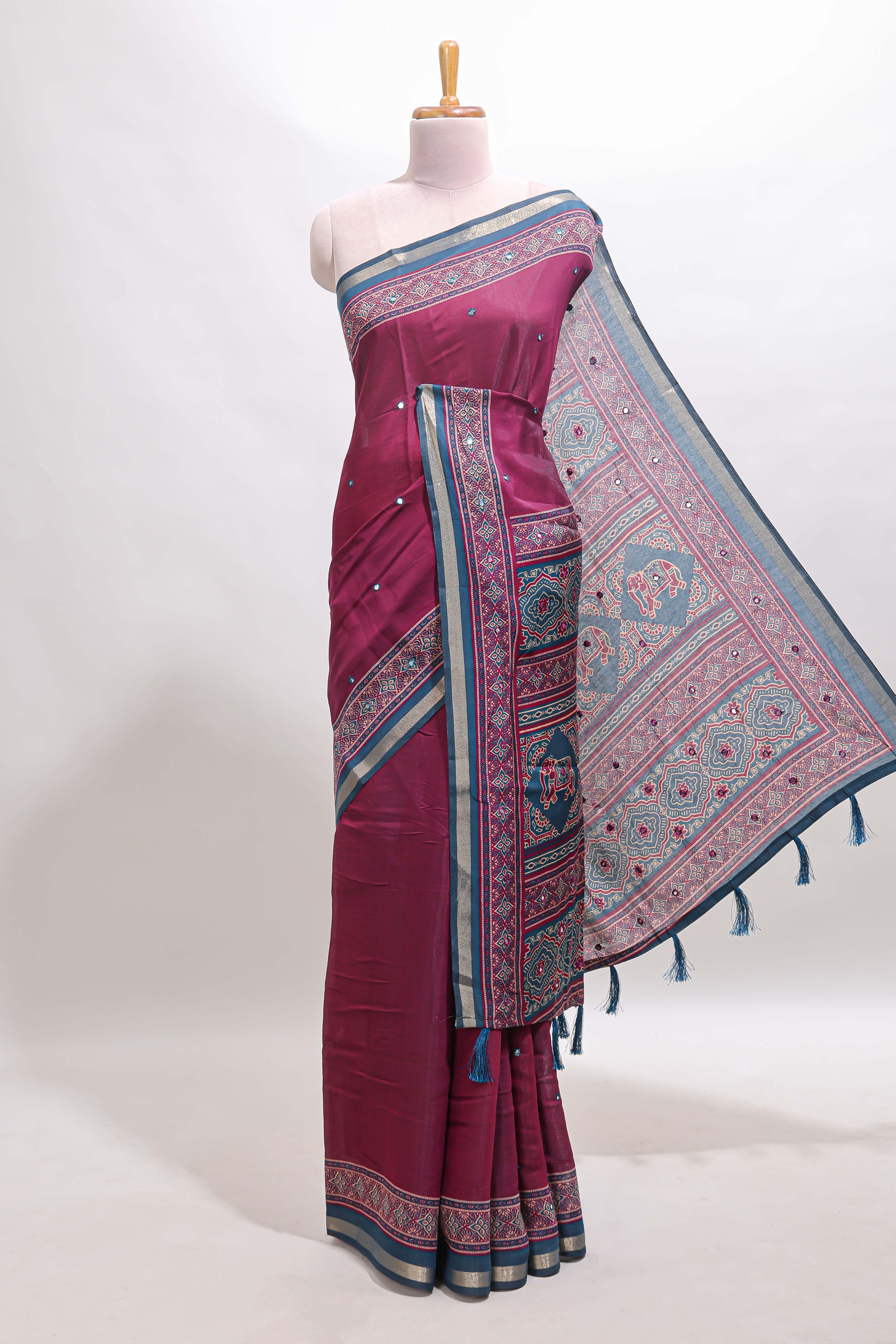 Purple embroidery mirror work marsh mellow saree with contrast border and printed blouse