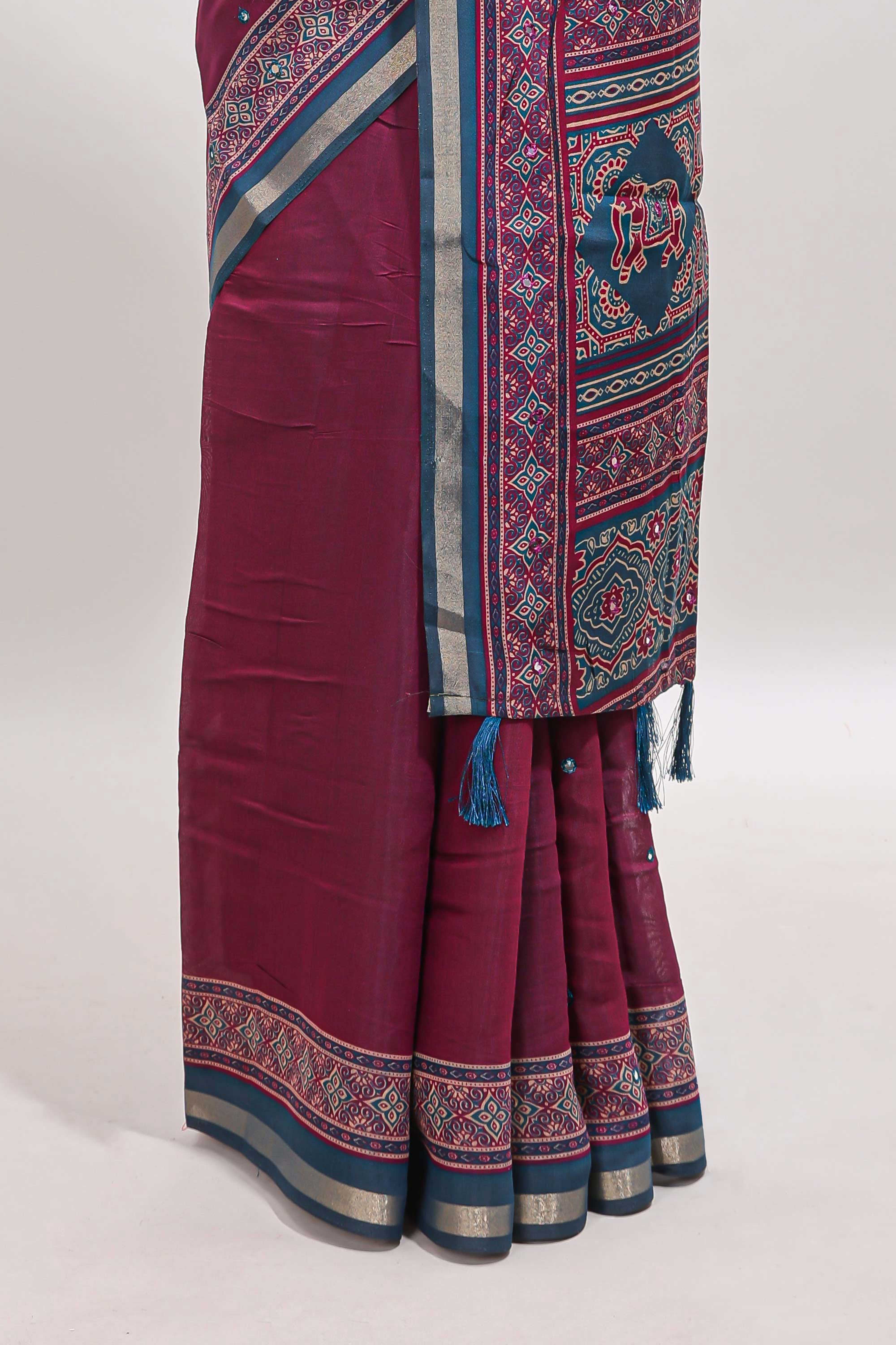 Purple embroidery mirror work marsh mellow saree with contrast border and printed blouse