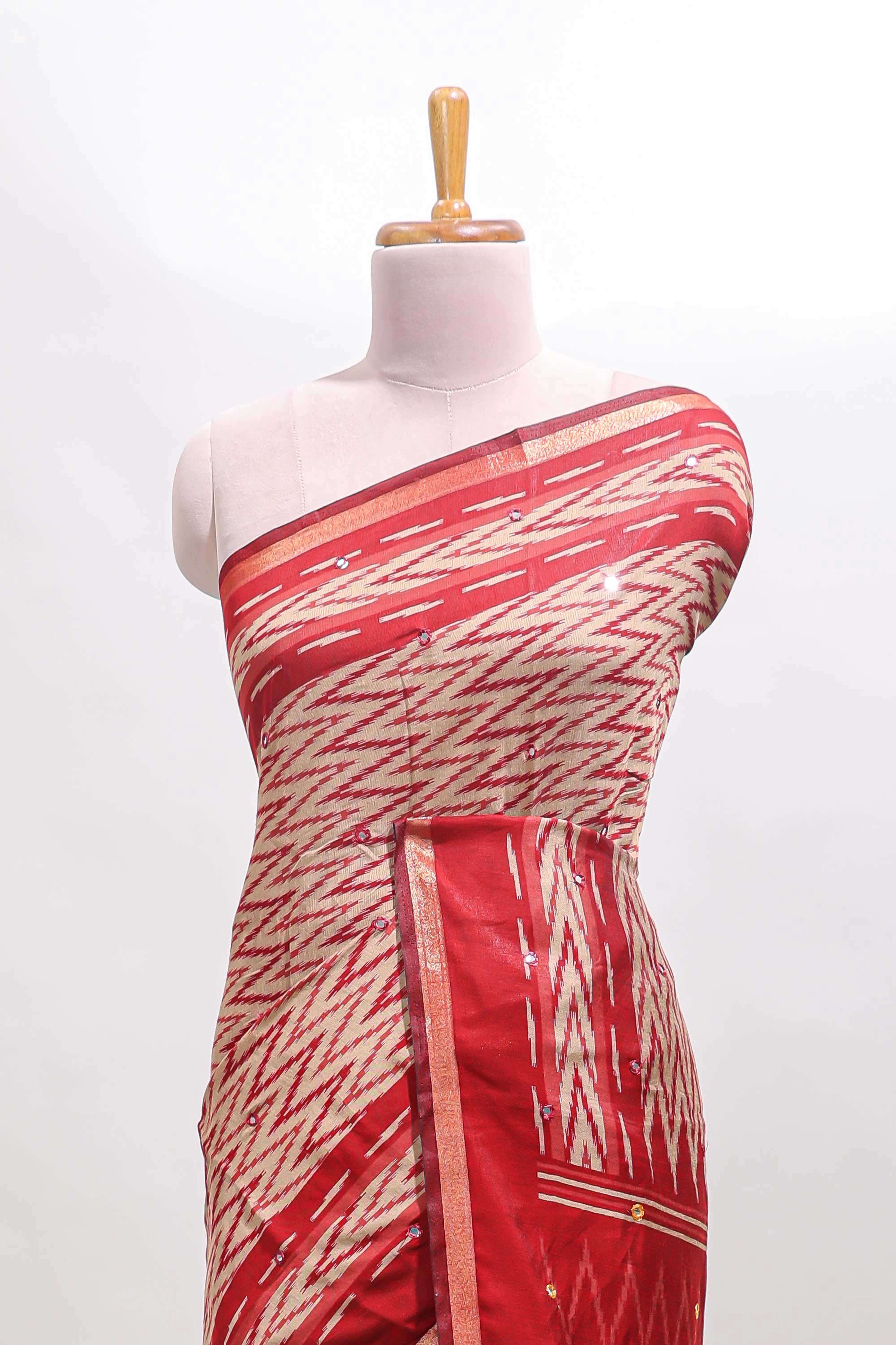 Beige chevron embroidery mirror work marsh mellow saree with contrast red border and printed blouse