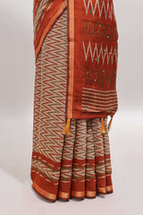 Beige chevron embroidery mirror work marsh mellow saree with contrast orange border and printed blouse