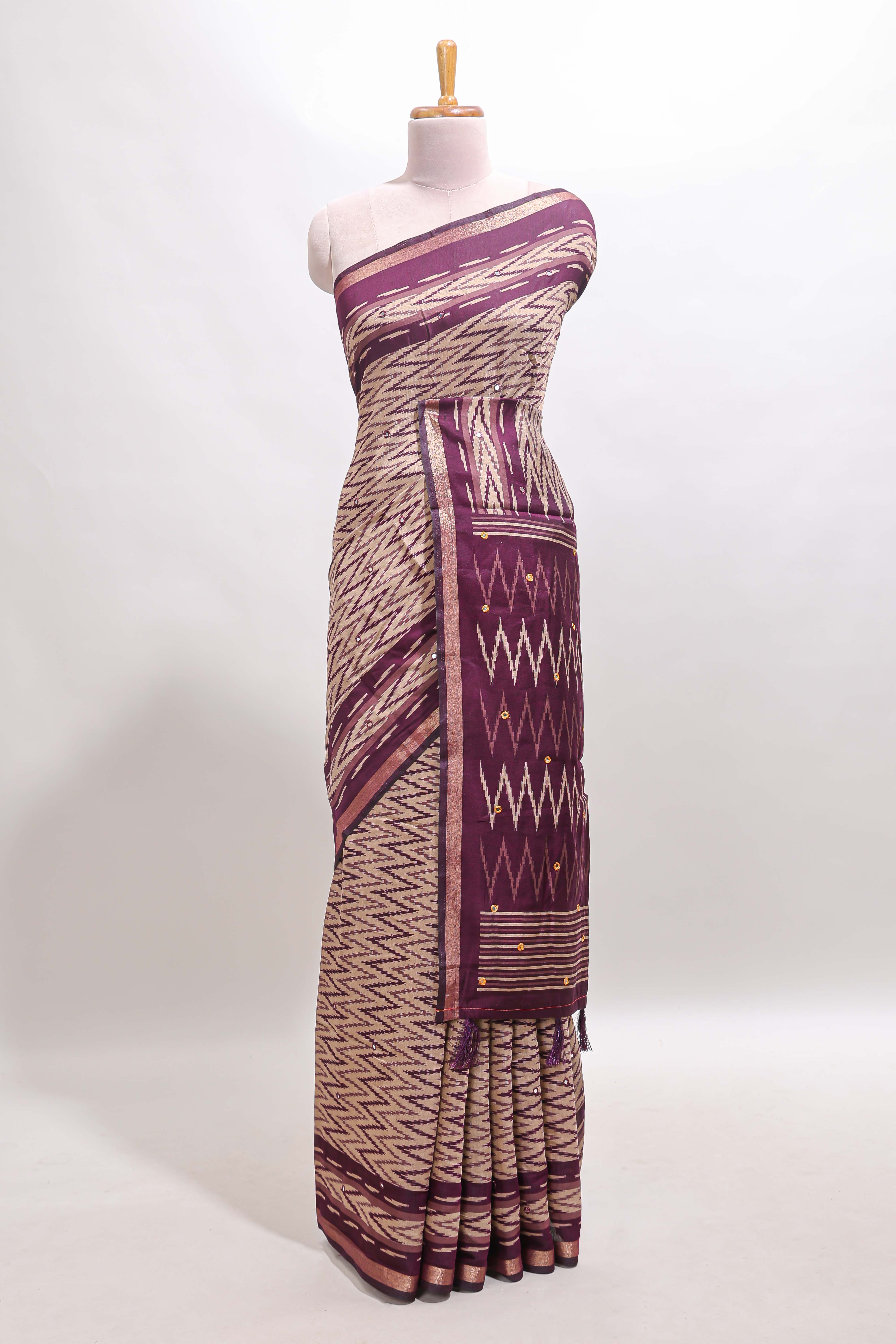 Beige chevron embroidery mirror work marsh mellow saree with contrast purple border and printed blouse