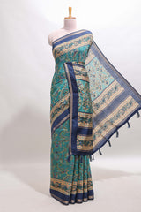 Peacock blue floral motifs design marsh mellow saree with contrast border and printed blouse