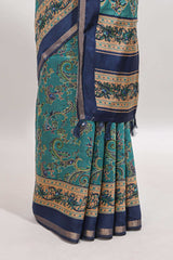 Peacock blue floral motifs design marsh mellow saree with contrast border and printed blouse
