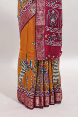 Mustard peacock & floral design marsh mellow saree with contrast border and printed blouse