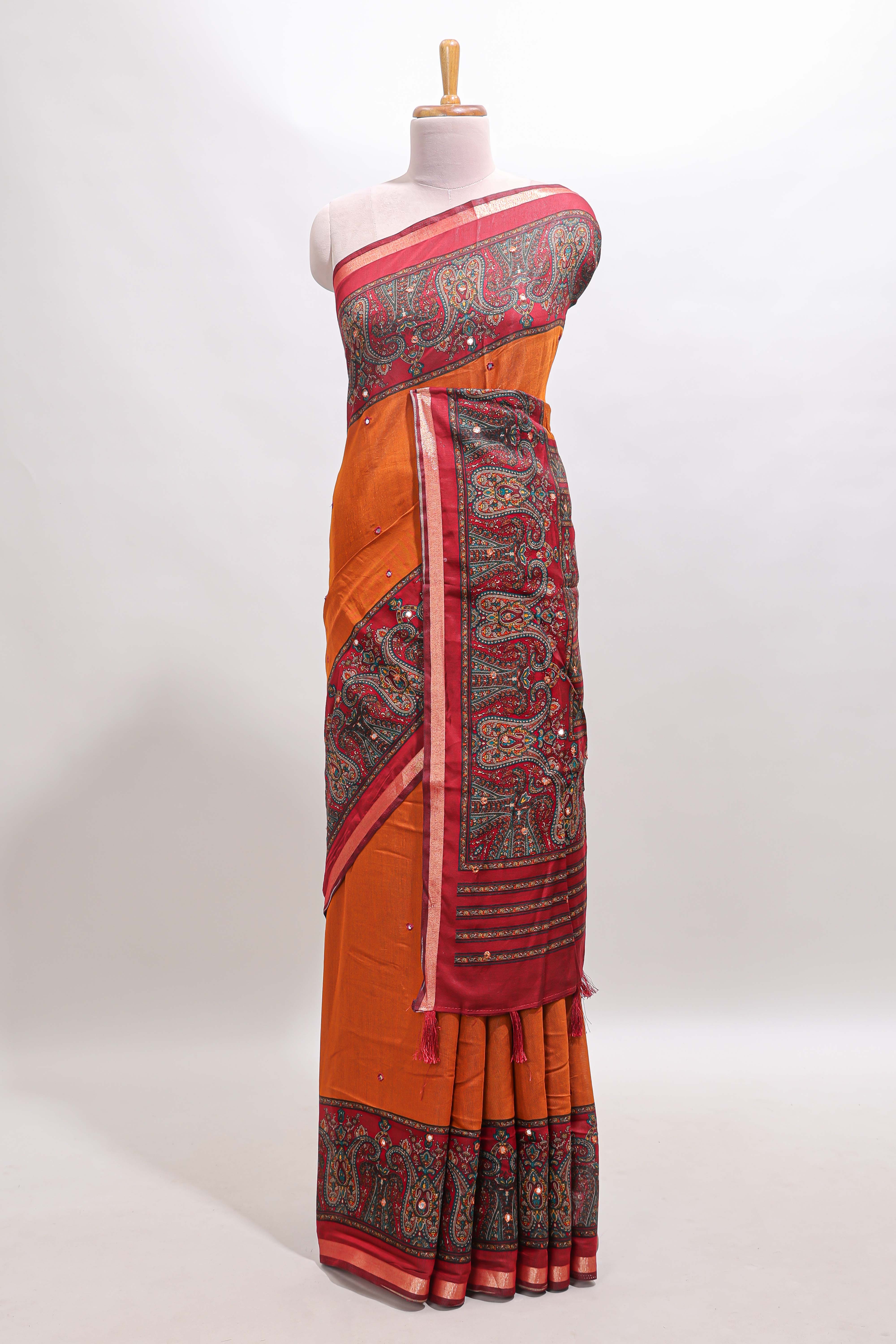 Orange mirror work embroidery design marsh mellow saree with contrast border and printed blouse