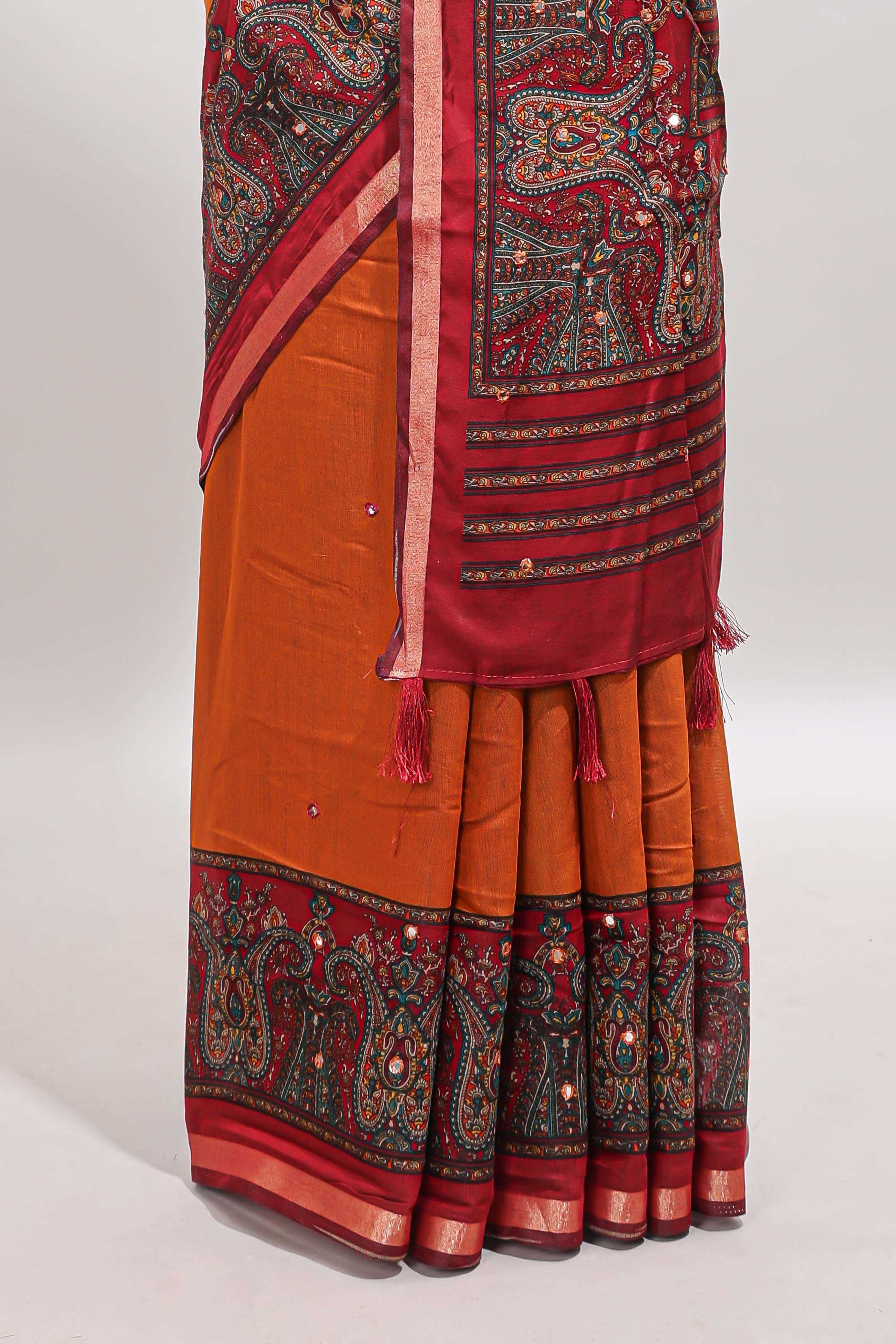 Orange mirror work embroidery design marsh mellow saree with contrast border and printed blouse