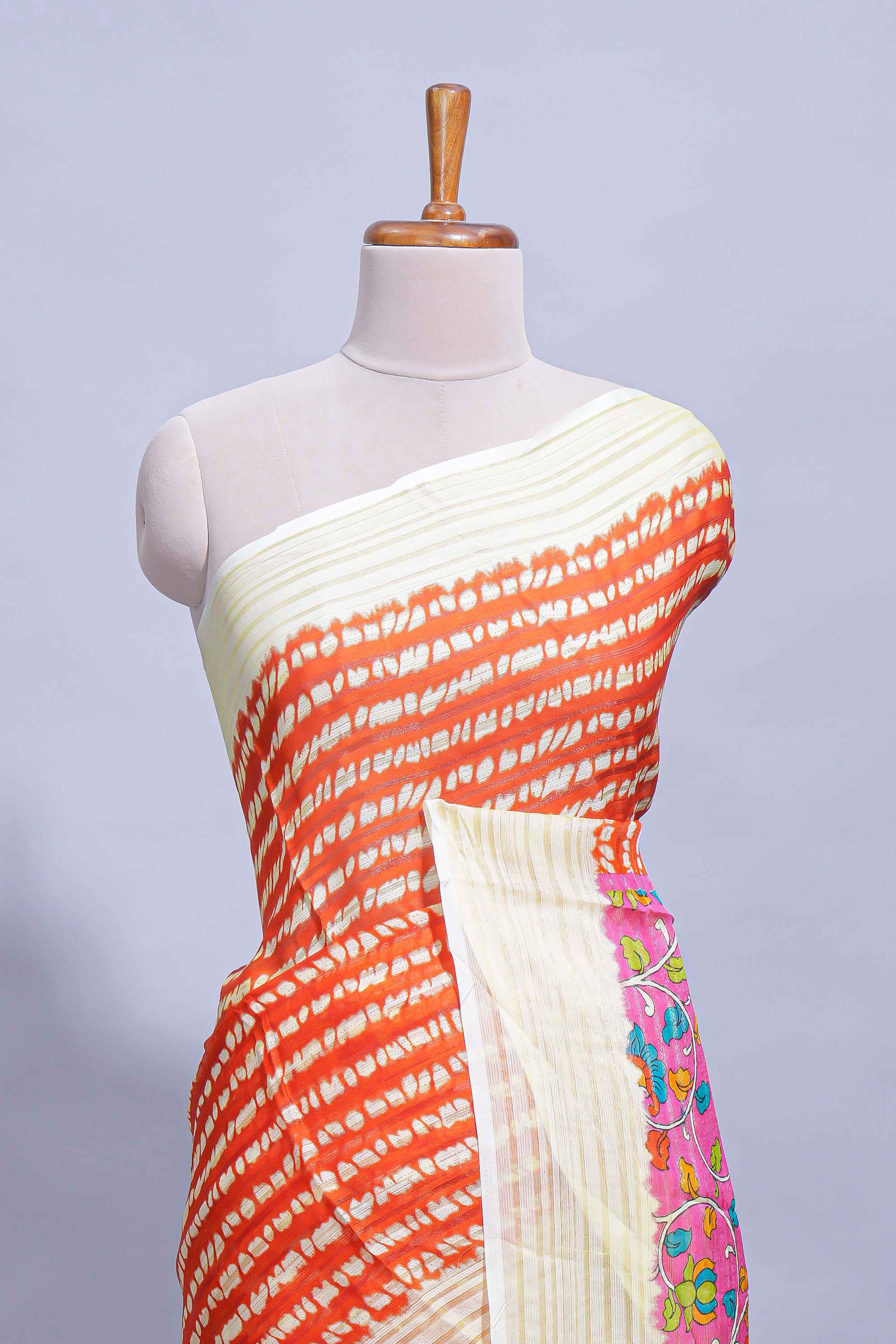 Orange colourshibori printed marsh mellow saree with contrast border and matching printed blouse