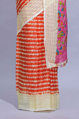 Orange colourshibori printed marsh mellow saree with contrast border and matching printed blouse