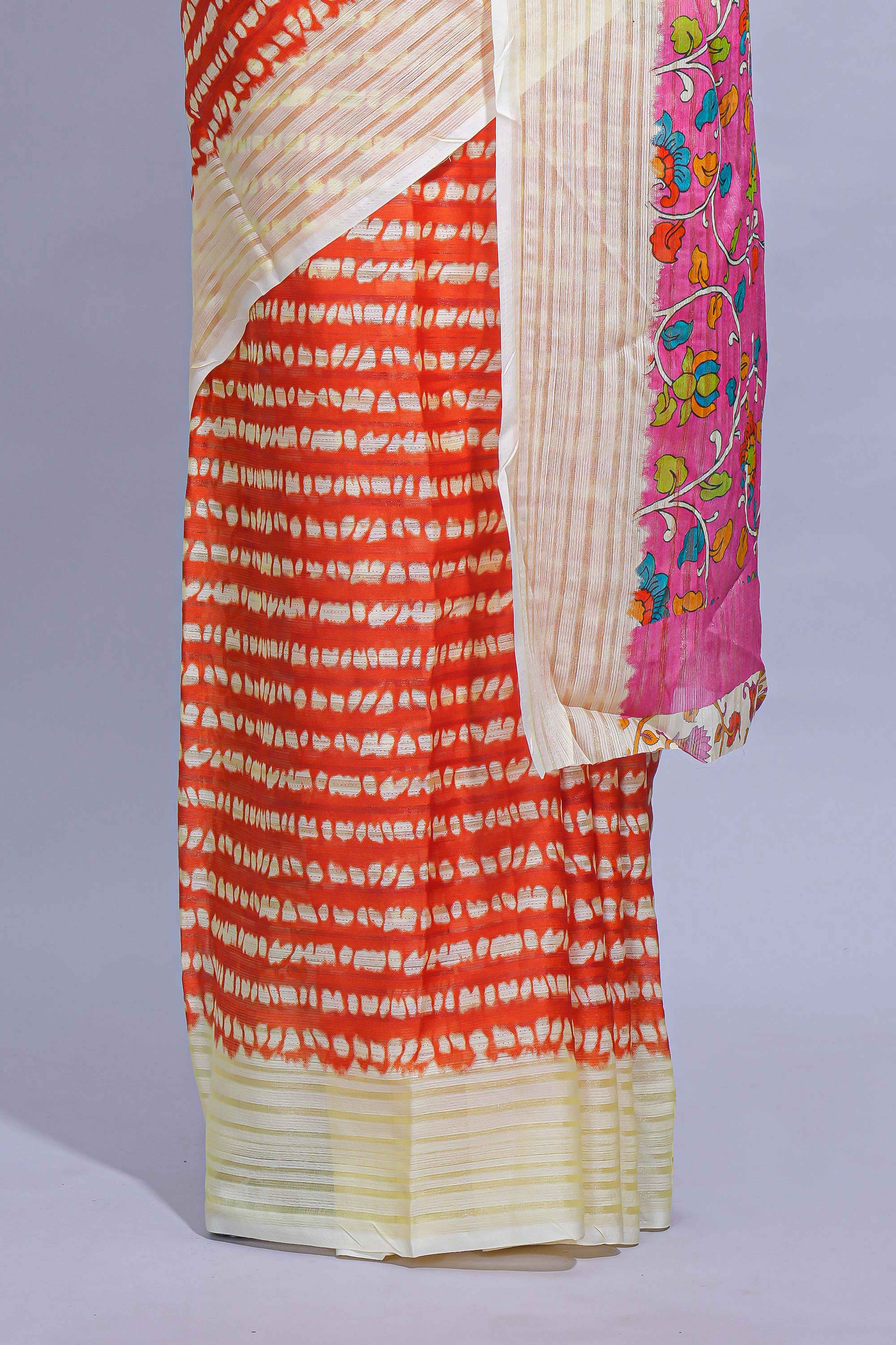Orange colourshibori printed marsh mellow saree with contrast border and matching printed blouse