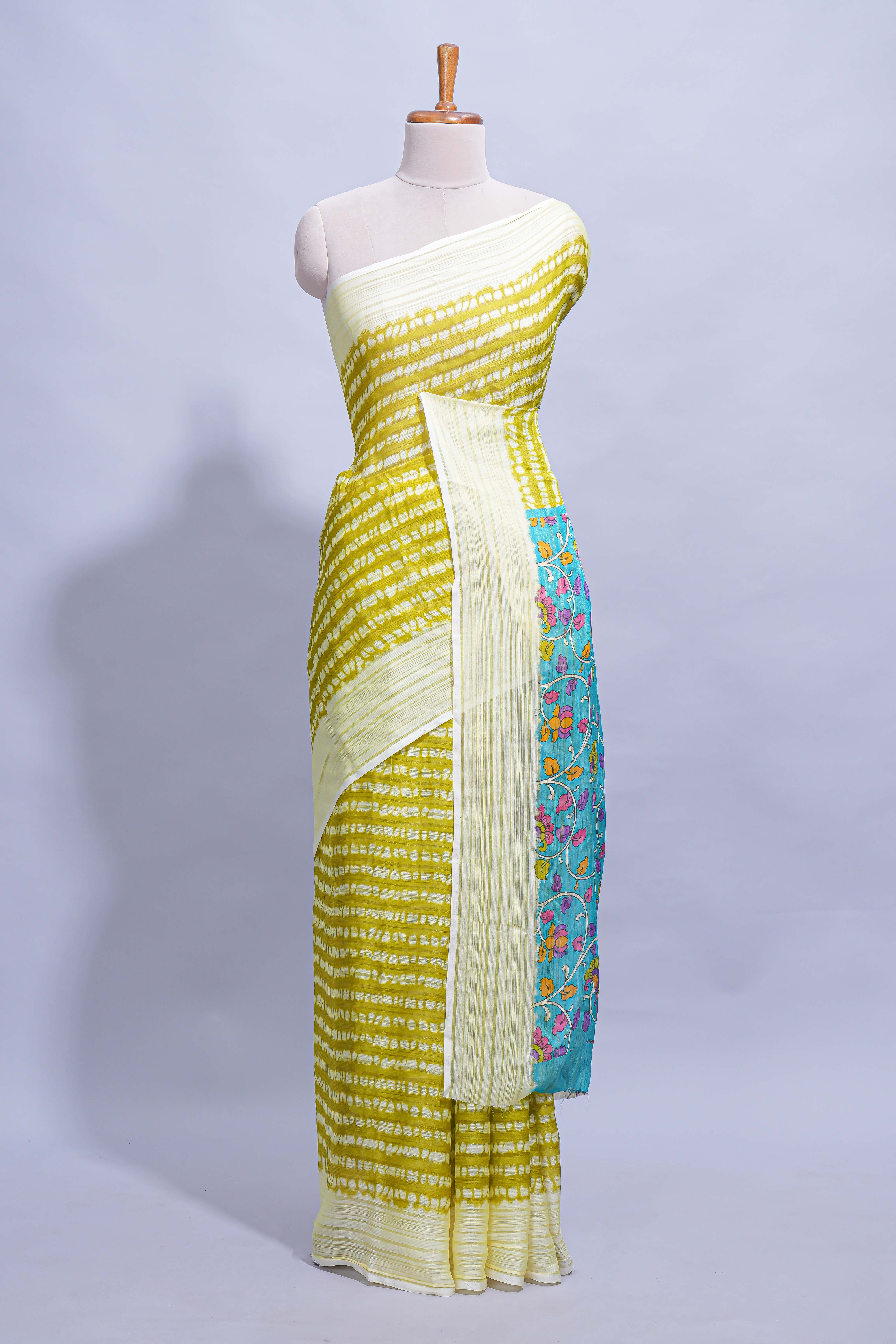 Green colourshibori printed marsh mellow saree with contrast border and matching printed blouse