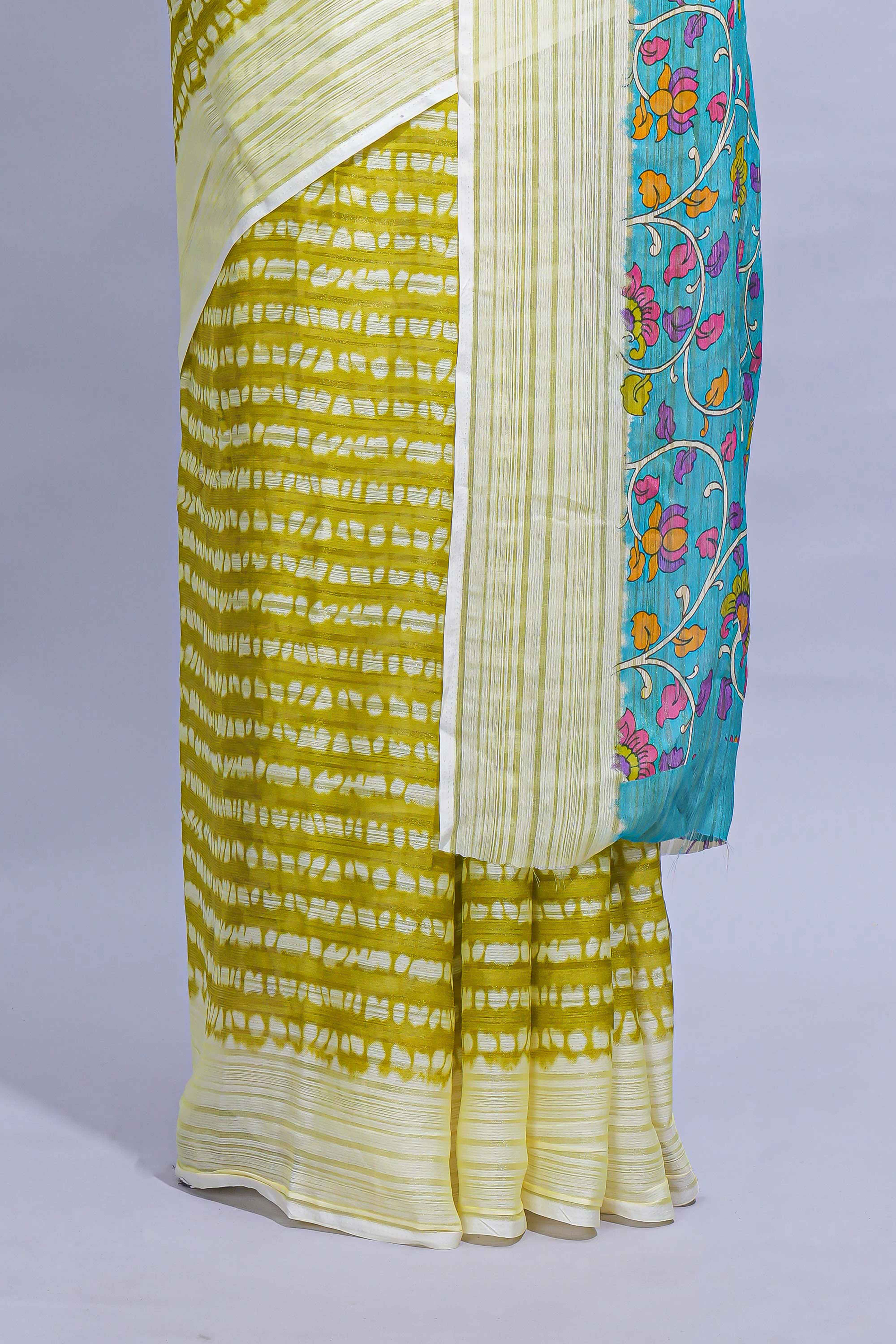 Green colourshibori printed marsh mellow saree with contrast border and matching printed blouse
