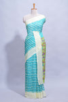 Blue colourshibori printed marsh mellow saree with contrast border and matching printed blouse