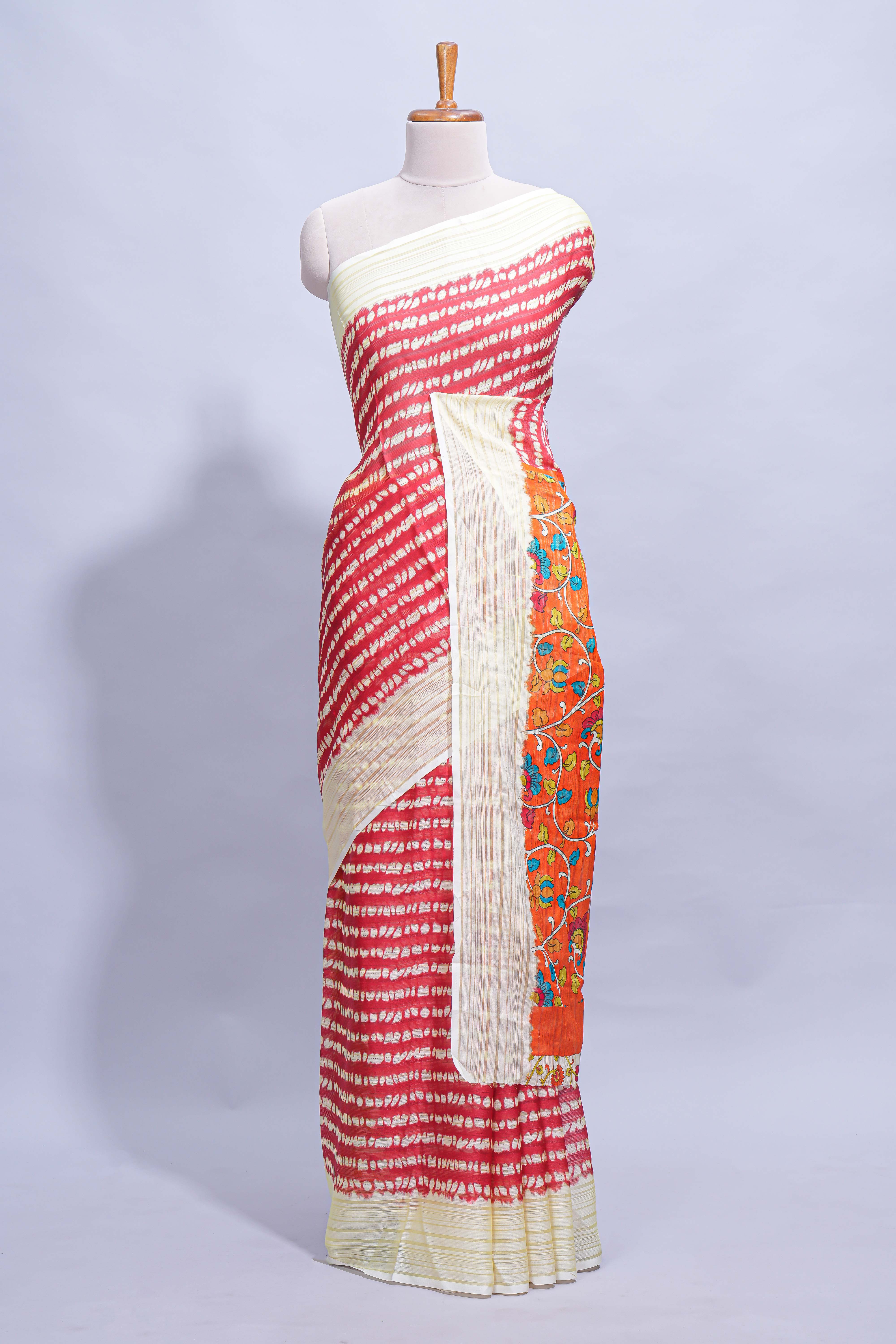 Red colourshibori printed marsh mellow saree with contrast border and matching printed blouse