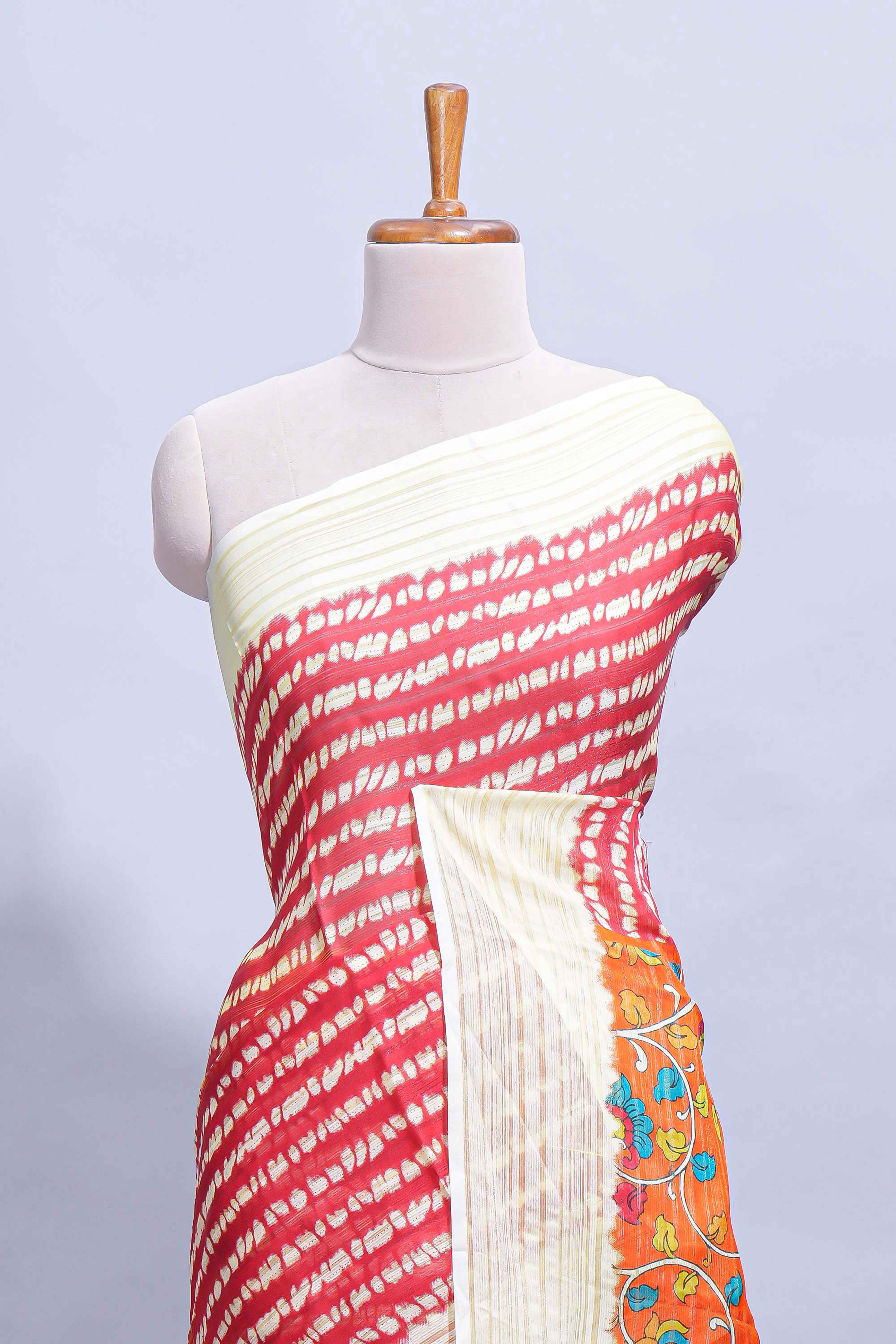 Red colourshibori printed marsh mellow saree with contrast border and matching printed blouse