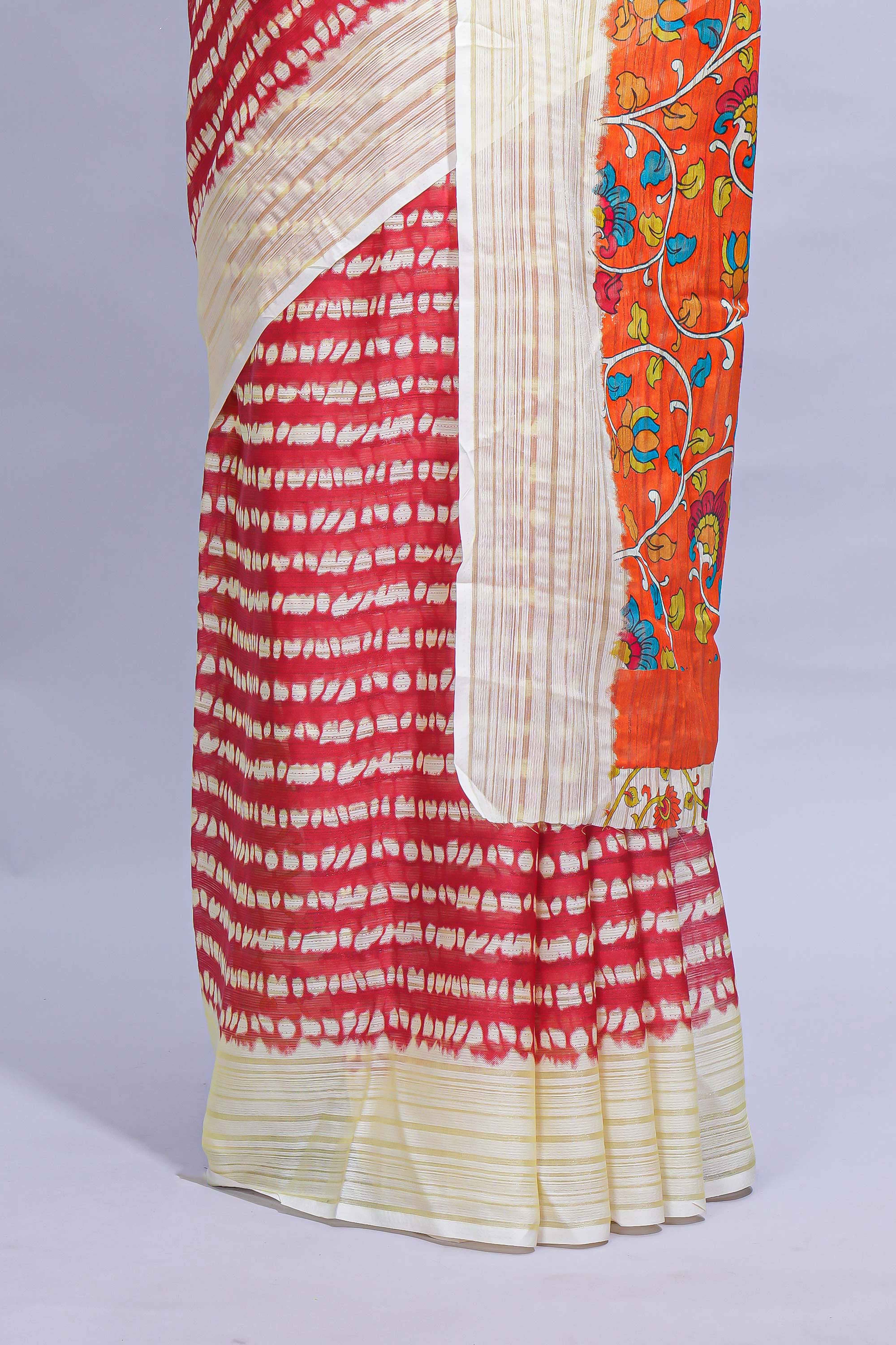 Red colourshibori printed marsh mellow saree with contrast border and matching printed blouse