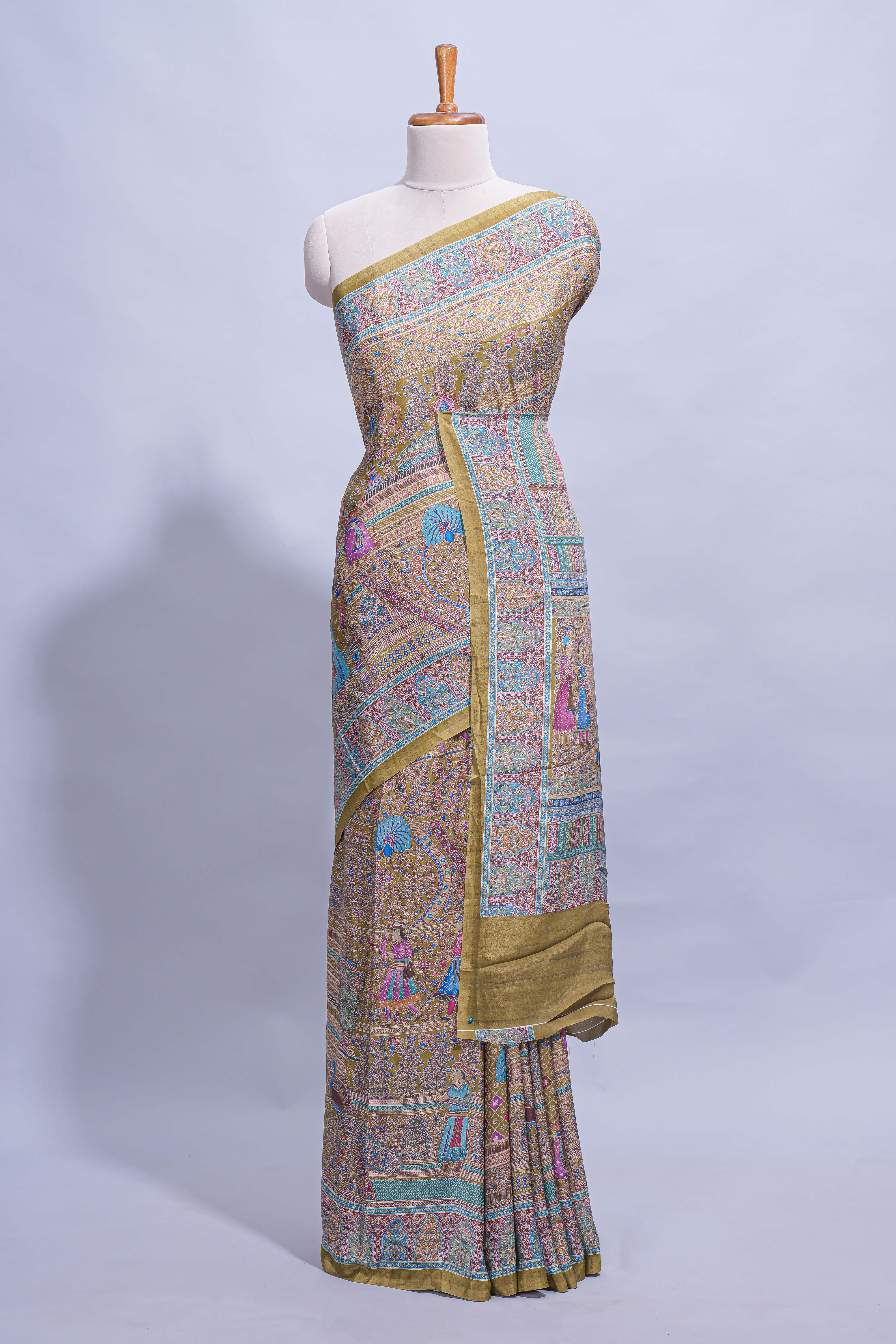 Olive green mughal printed marsh mellow saree with self border and self printed pallu along with matching blouse
