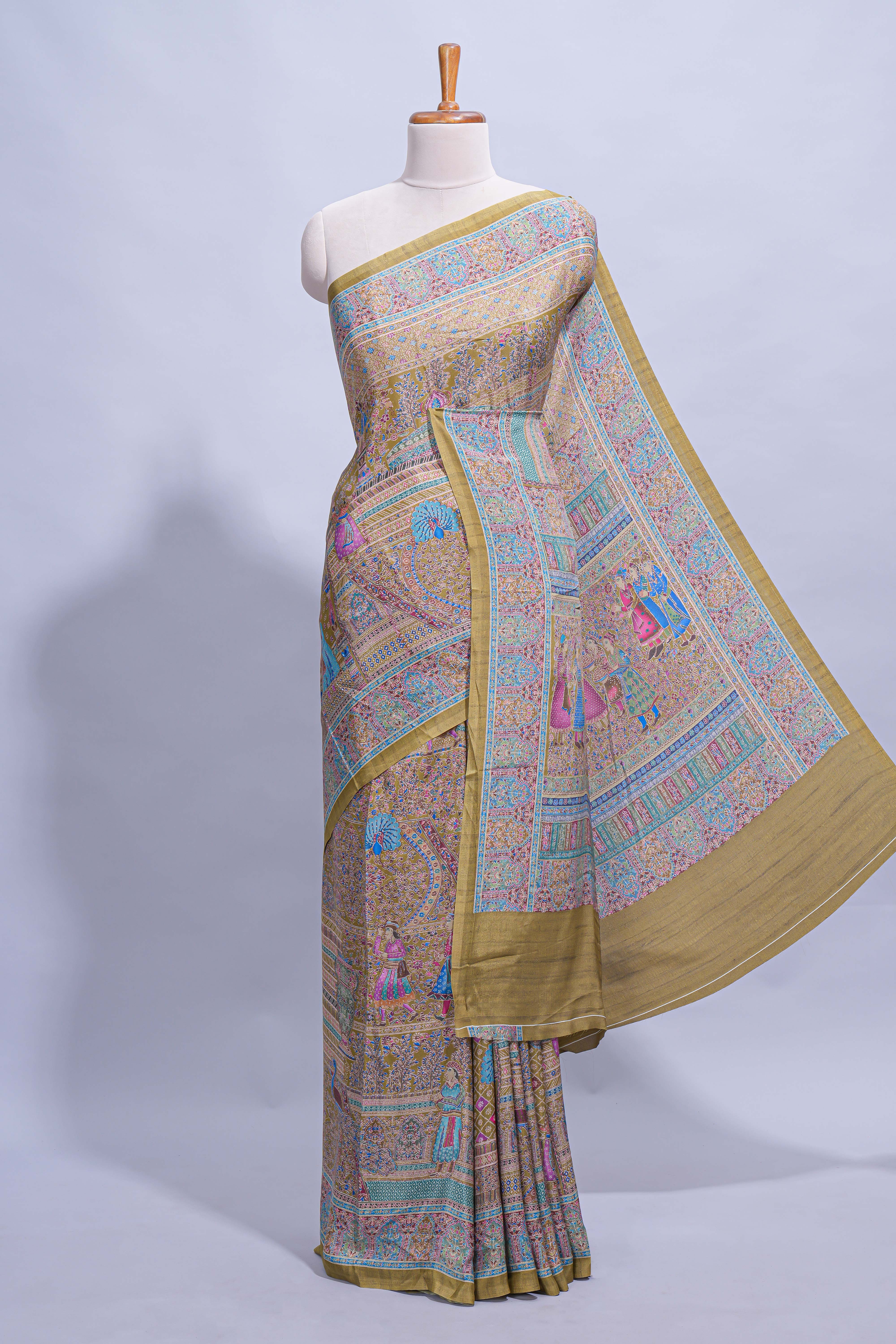 Olive green mughal printed marsh mellow saree with self border and self printed pallu along with matching blouse