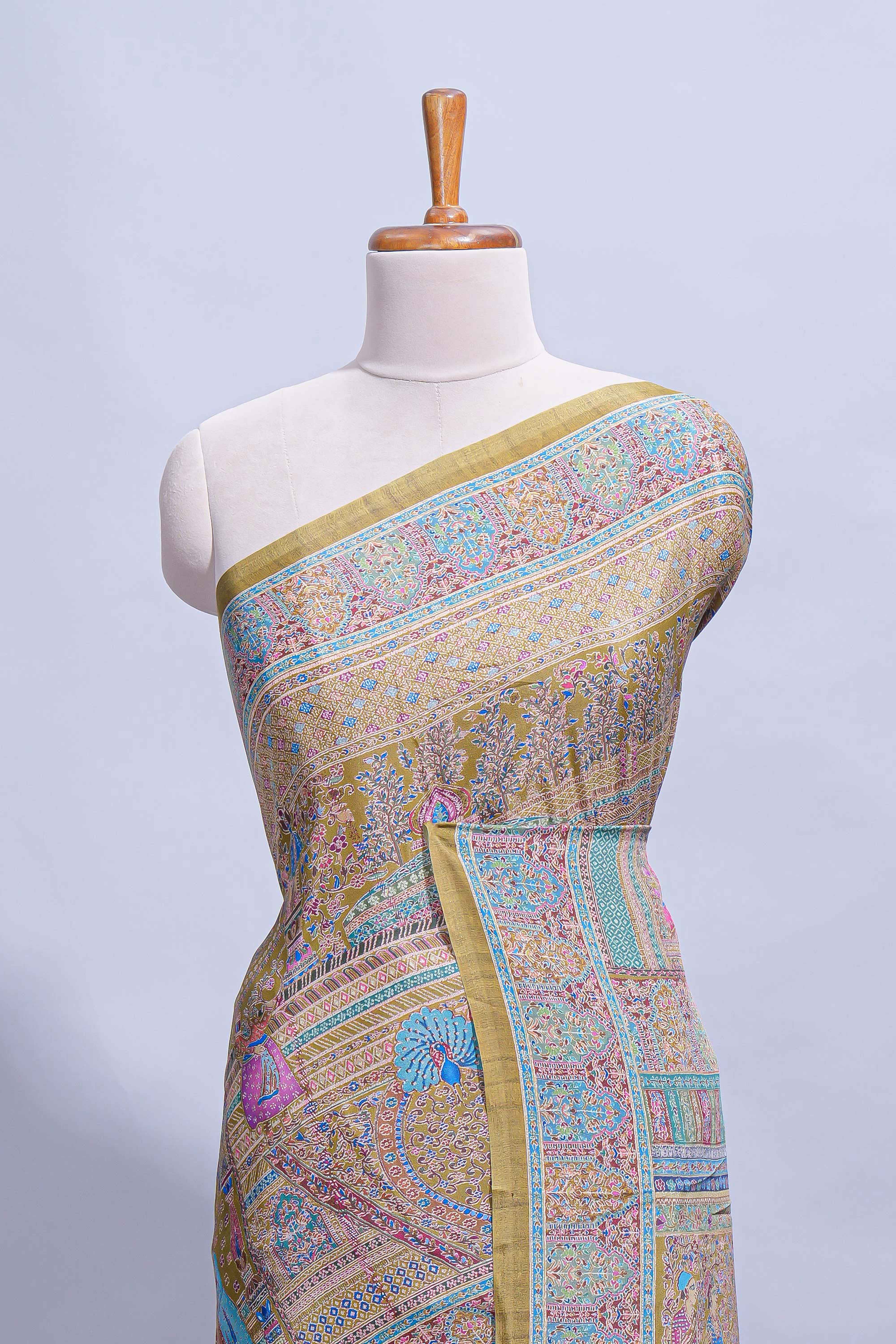 Olive green mughal printed marsh mellow saree with self border and self printed pallu along with matching blouse