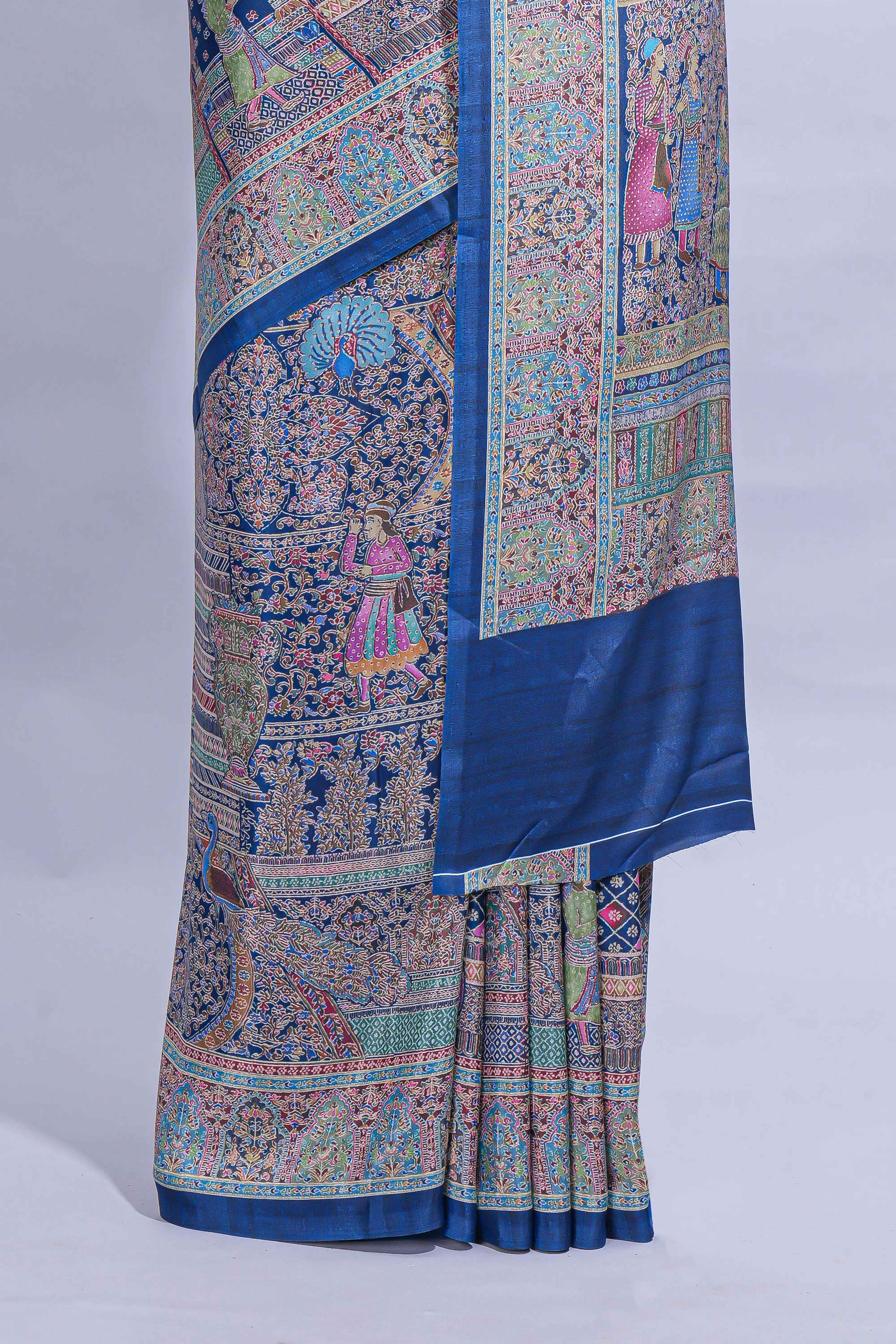 Royal blue mughal printed marsh mellow saree with self border and self printed pallu along with matching blouse