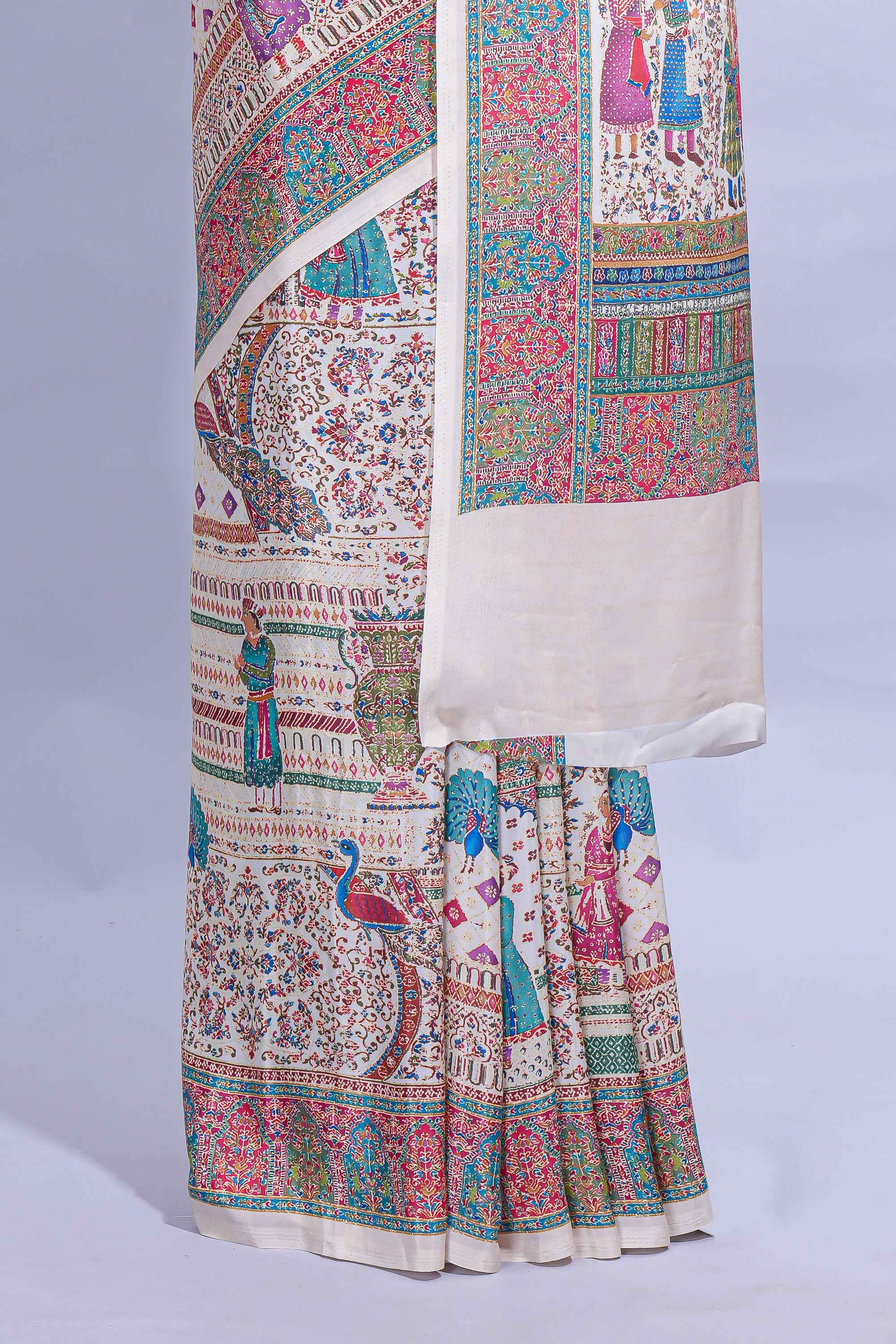 Ivory colour mughal printed marsh mellow saree with self border and self printed pallu along with matching blouse