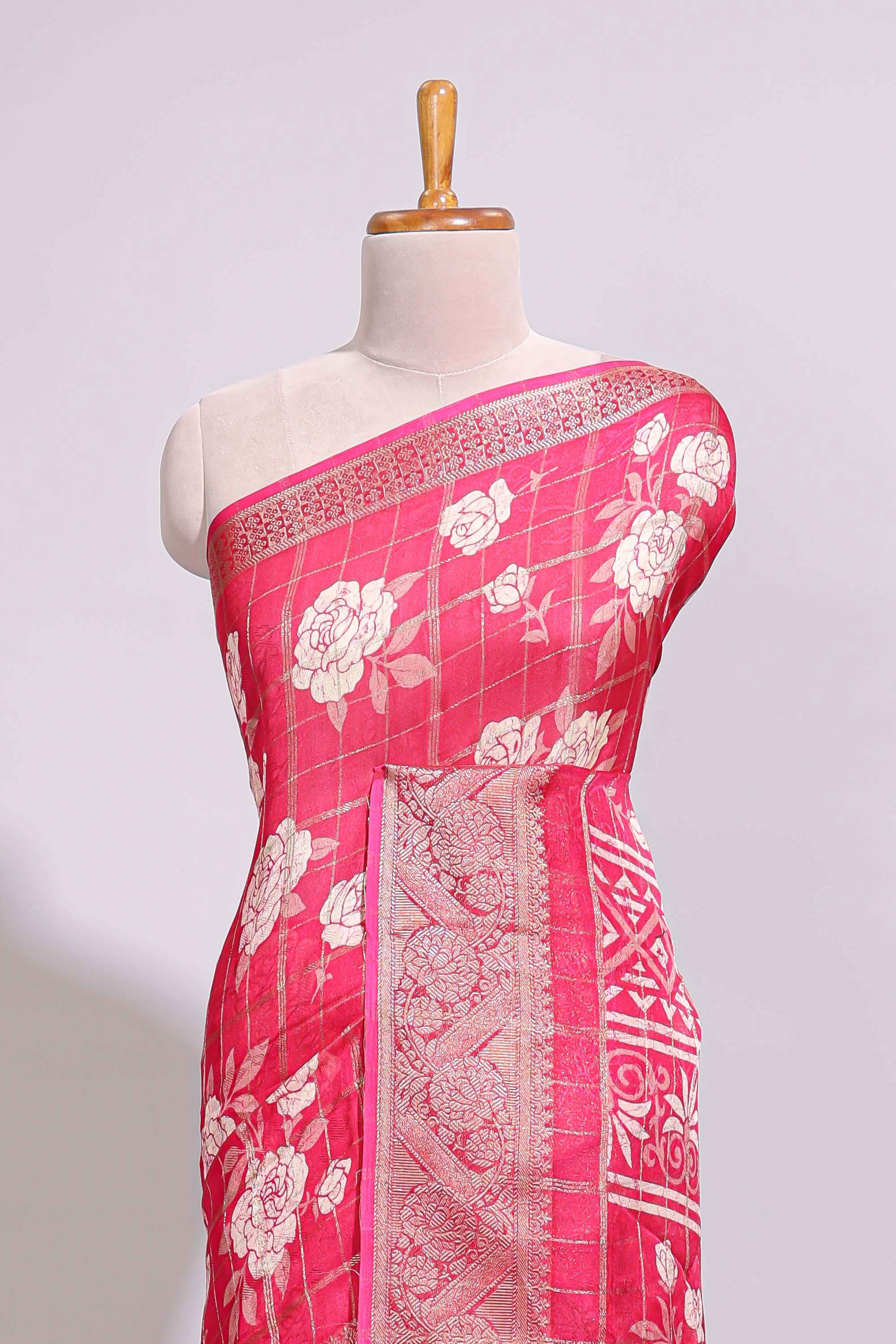 Pink checked floral design marsh mellow saree with self zari border and matching blouse