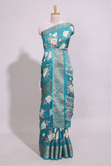 Teal green checked floral design marsh mellow saree with self zari border and matching blouse