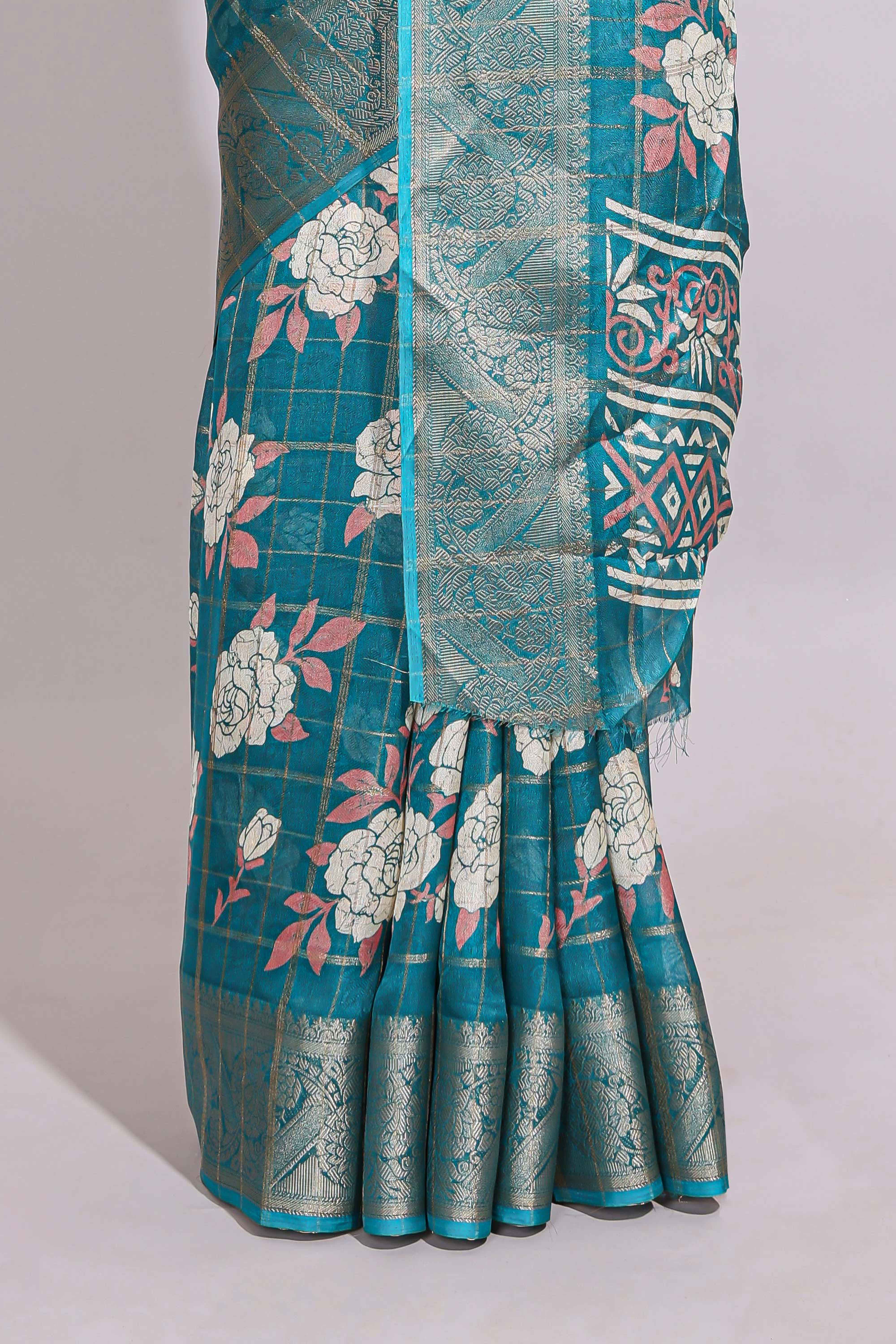 Teal green checked floral design marsh mellow saree with self zari border and matching blouse