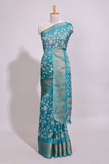 Teal green checked floral design marsh mellow saree with self zari border and matching zari blouse