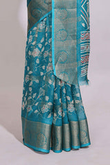 Teal green checked floral design marsh mellow saree with self zari border and matching zari blouse