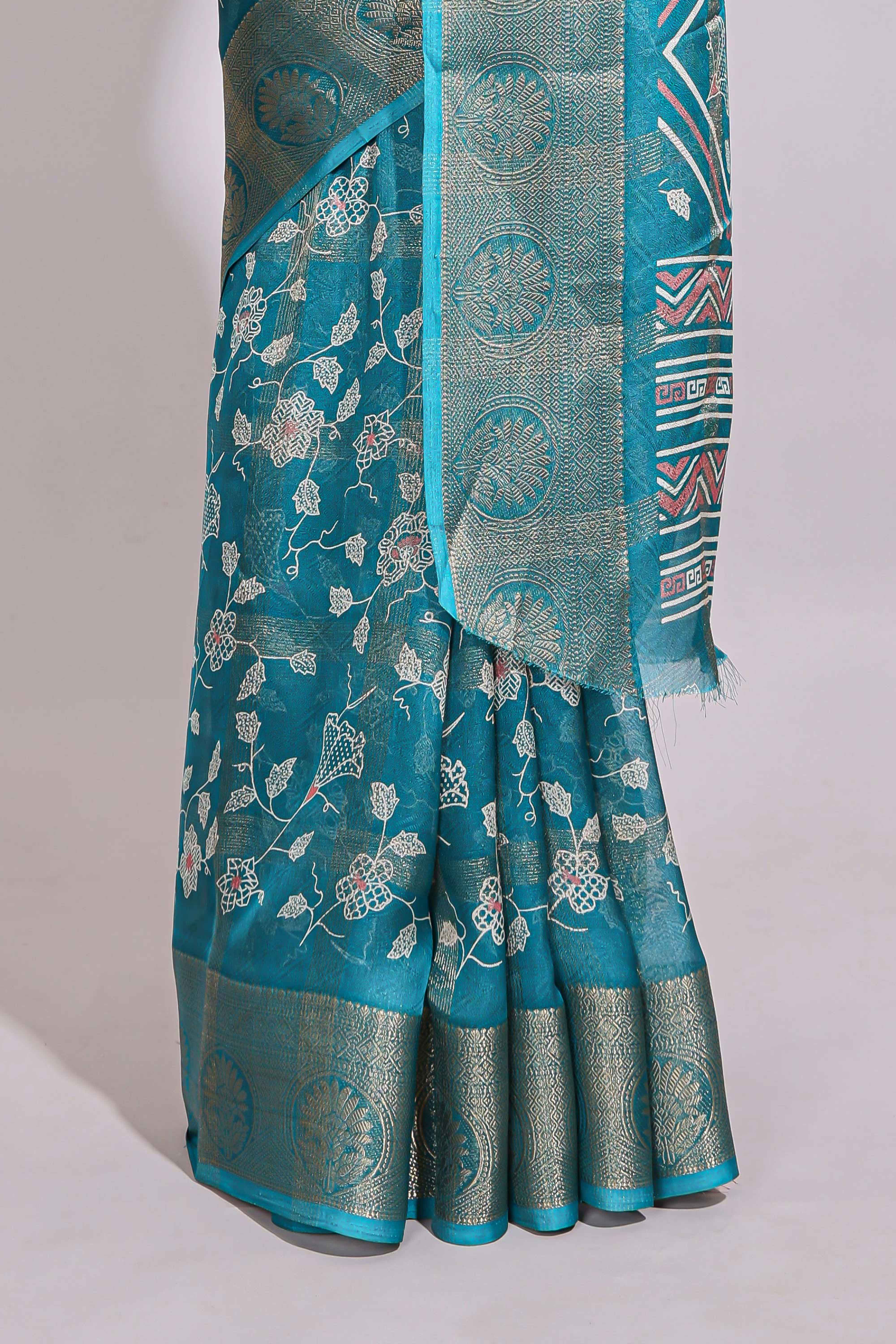 Teal green checked floral design marsh mellow saree with self zari border and matching zari blouse