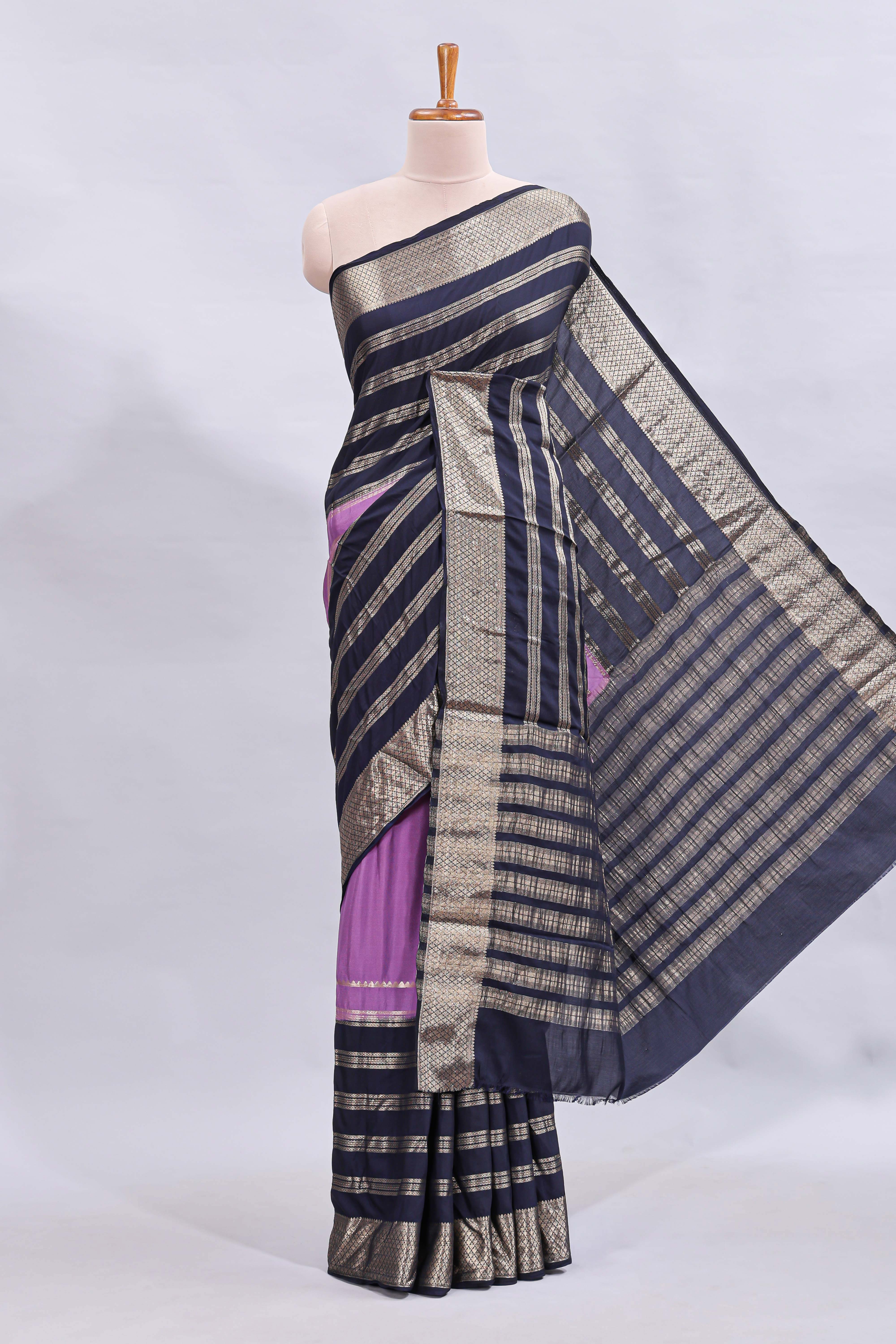 Lavender zari design mushru silk saree with contrast striped zari border and blouse