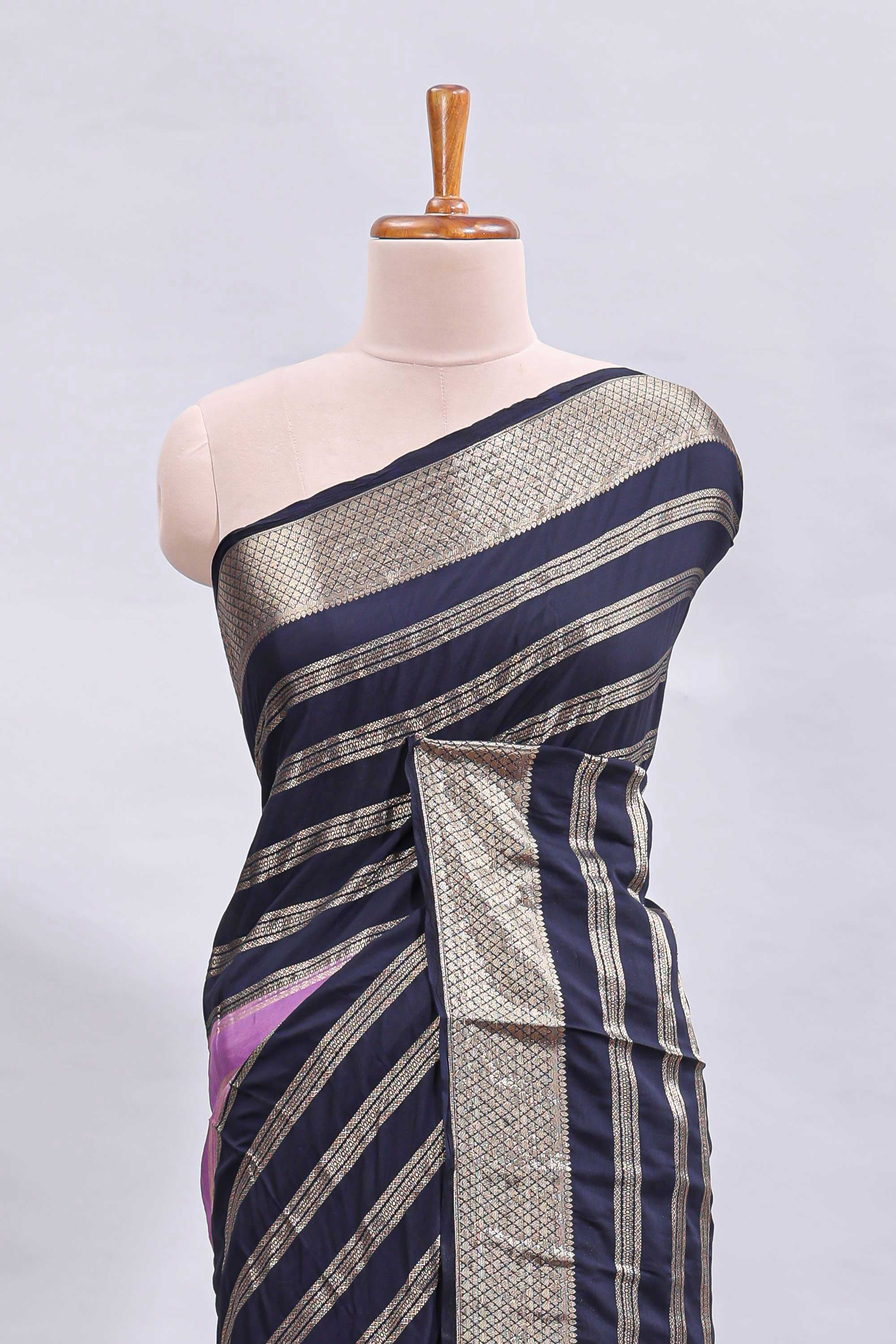 Lavender zari design mushru silk saree with contrast striped zari border and blouse
