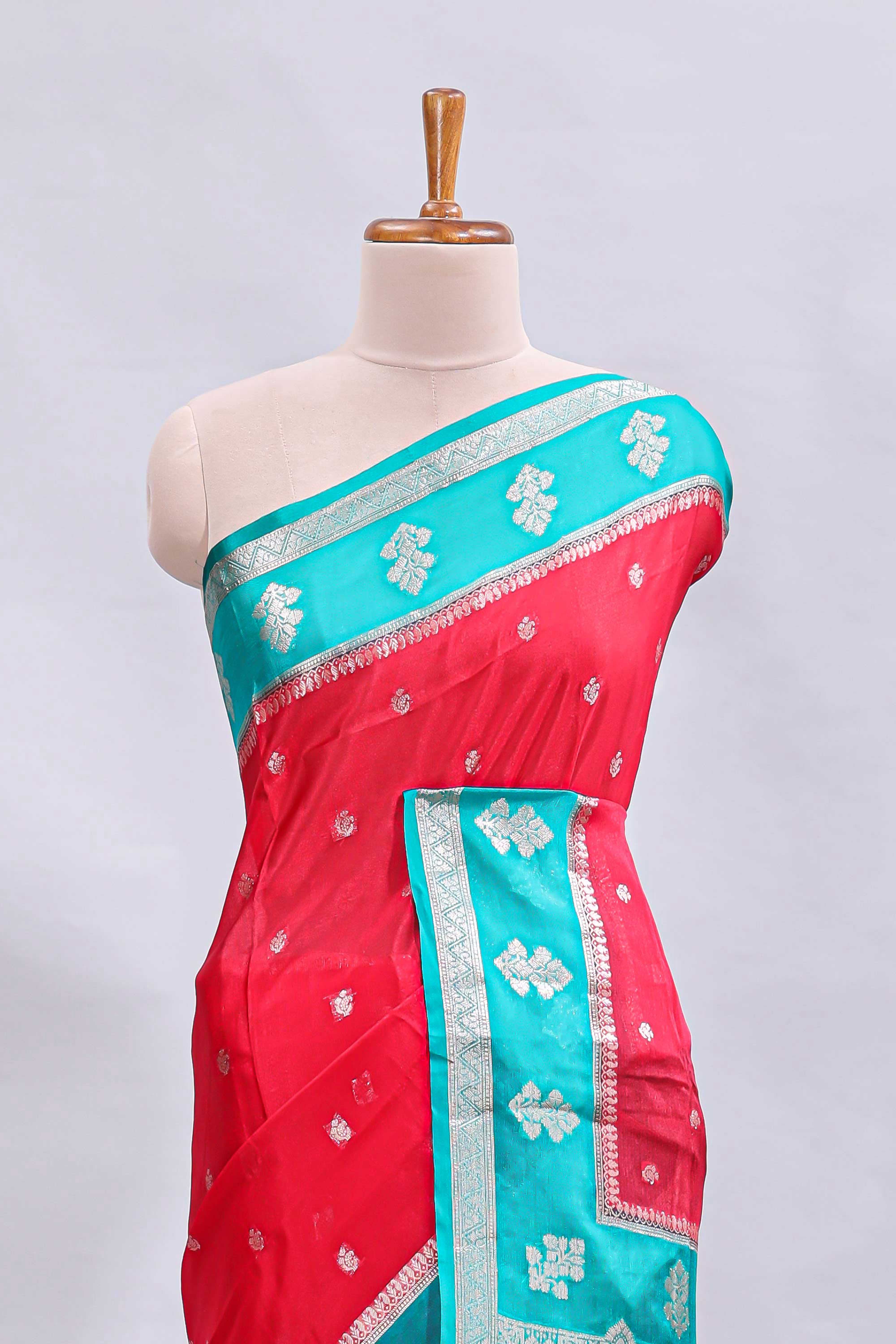 Red zari motifs design mushru silk saree with contrast border and zari blouse